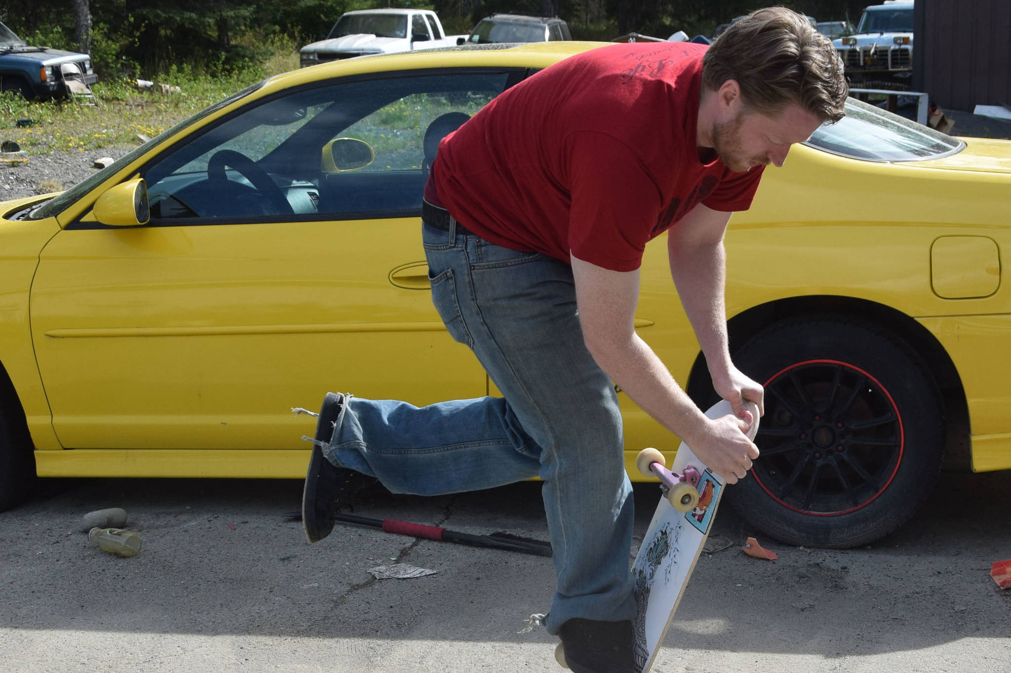 Vaughn Johnson performs a pogo maneuver outside his home in Nikiski, Alaska on May 29, 2019. (Photo by Brian Mazurek/Peninsula Clarion)