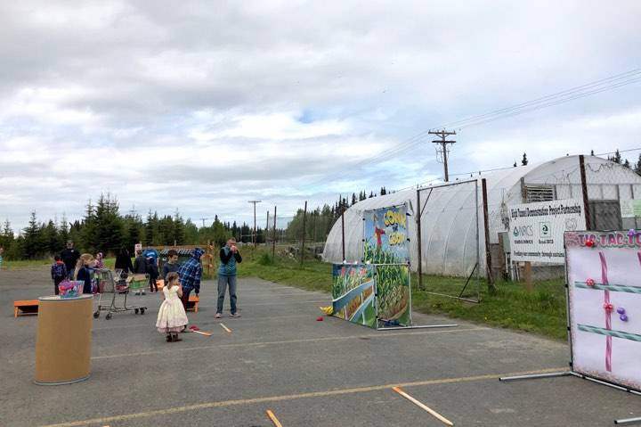 Residents and children play games during the Kenai Peninsula Food Bank Spring Festival and Fundraiser’s free community picnic, an event meant to thank the community, Friday, May 31, 2019, near Soldotna, Alaska. (Photo by Victoria Petersen/Peninsula Clarion)