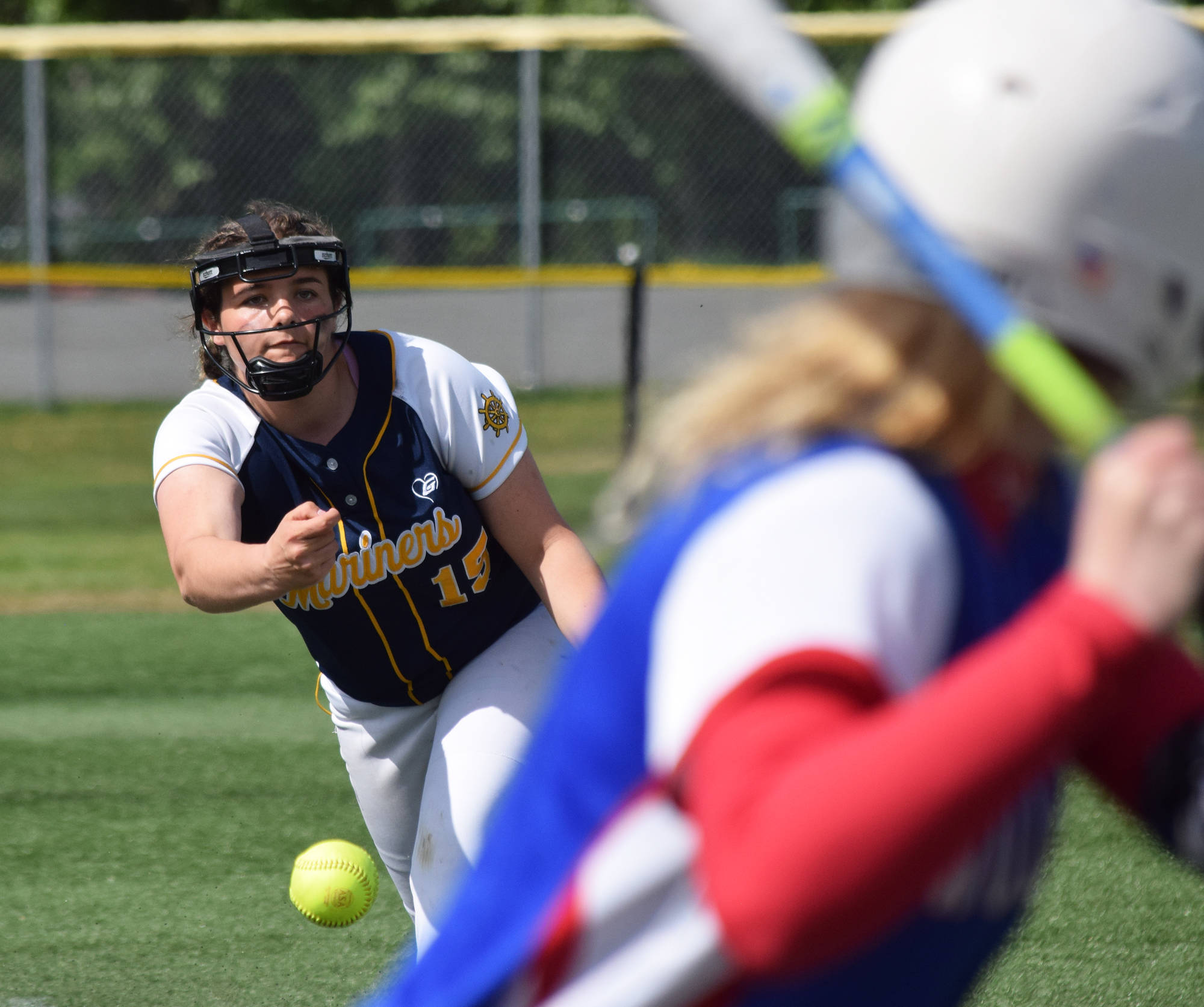 Homer’s Zoe Adkins unleashes a pitch for a Sitka batter at the Division II state softball tournament Friday, May 31, 2019, at Cartee Fields in Anchorage, Alaska.