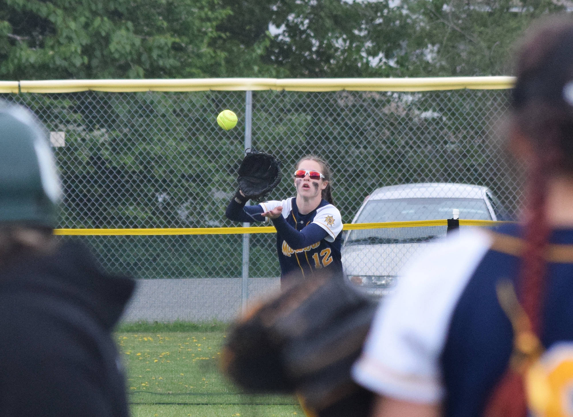 Homer centerfielder Grace Godfrey reels in a catch from Delta Junction at the Division II state softball tournament Friday, May 31, 2019, at Cartee Fields in Anchorage, Alaska.