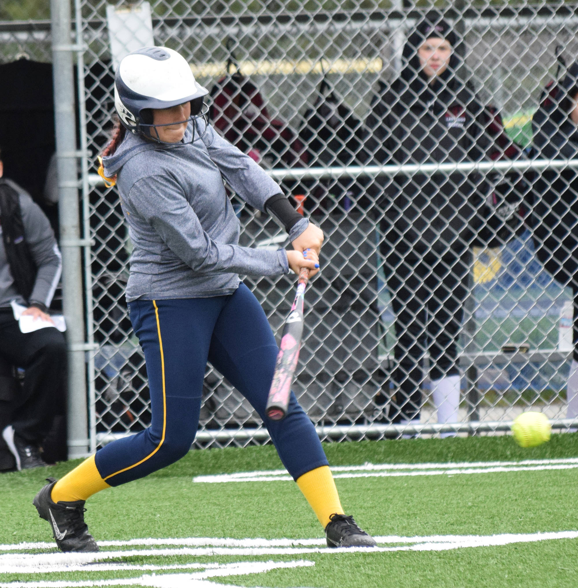 Homer’s Haylee Owen takes a swing at a pitch from Ketchikan at the Division II state softball tournament Saturday, June 1, 2019, at Cartee Fields in Anchorage. (Photo by Joey Klecka/Peninsula Clarion)