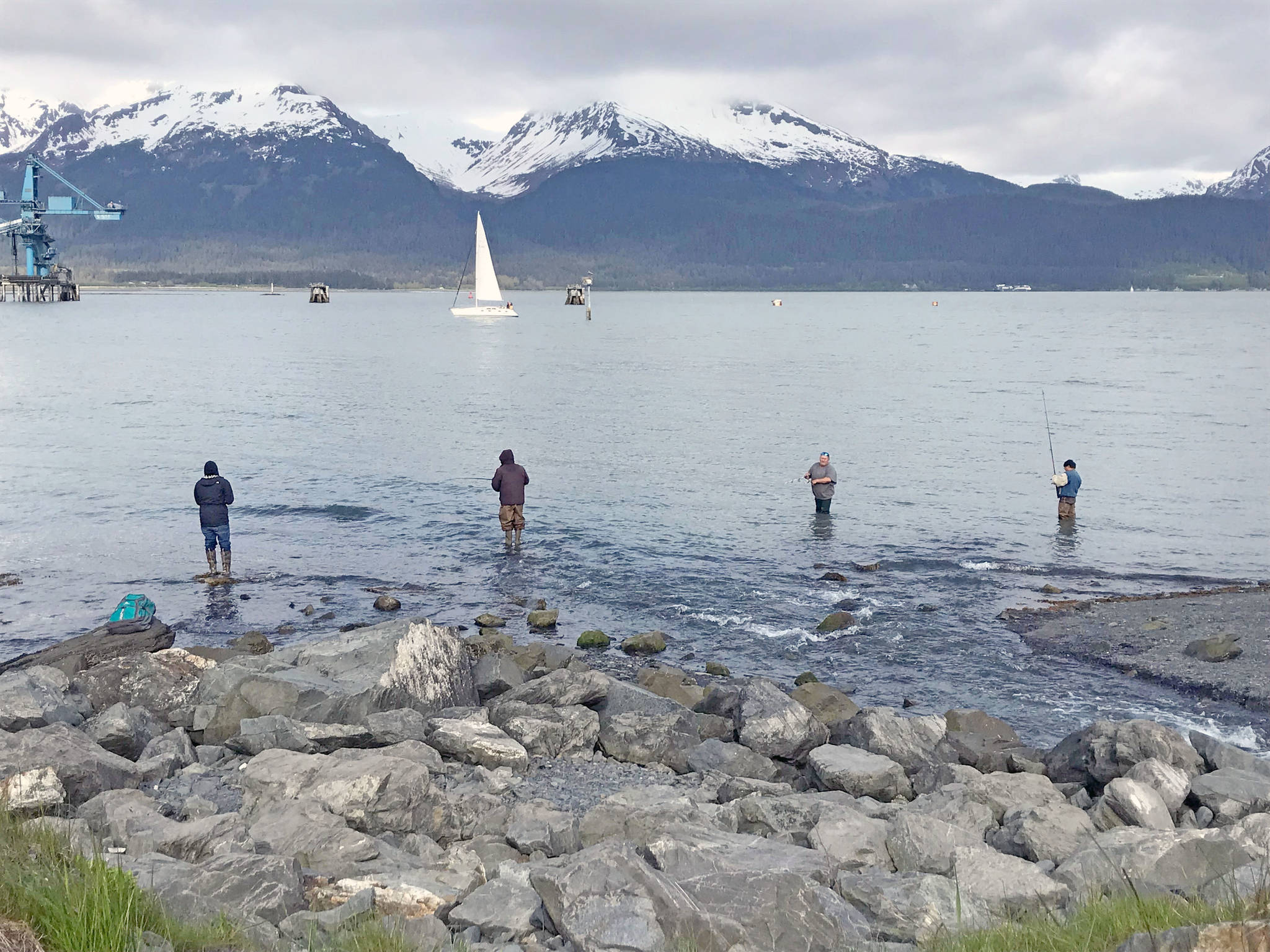 Anglers snag along the shore of Resurrection Bay near Seward, Alaska on Saturday, June 1, 2019. Unless otherwise noted, all waters of Resurrection Bay are open to snagging. (Photo by Kat Sorensen/Peninsula Clarion)