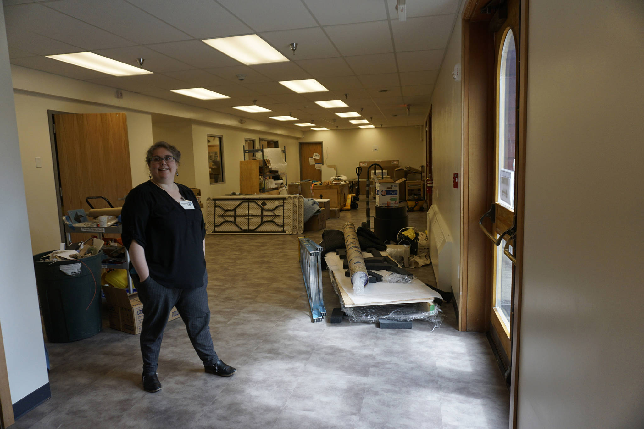Savanna Bradley, Pratt Museum collections manager, stands in the newly remodeled collections area on May 28, 2019, in Homer, Alaska. Some reorganization is ongoing, but when done, where she’s standing will be a space for community meetings and talks. (Photo by Michael Armstrong/Homer News)