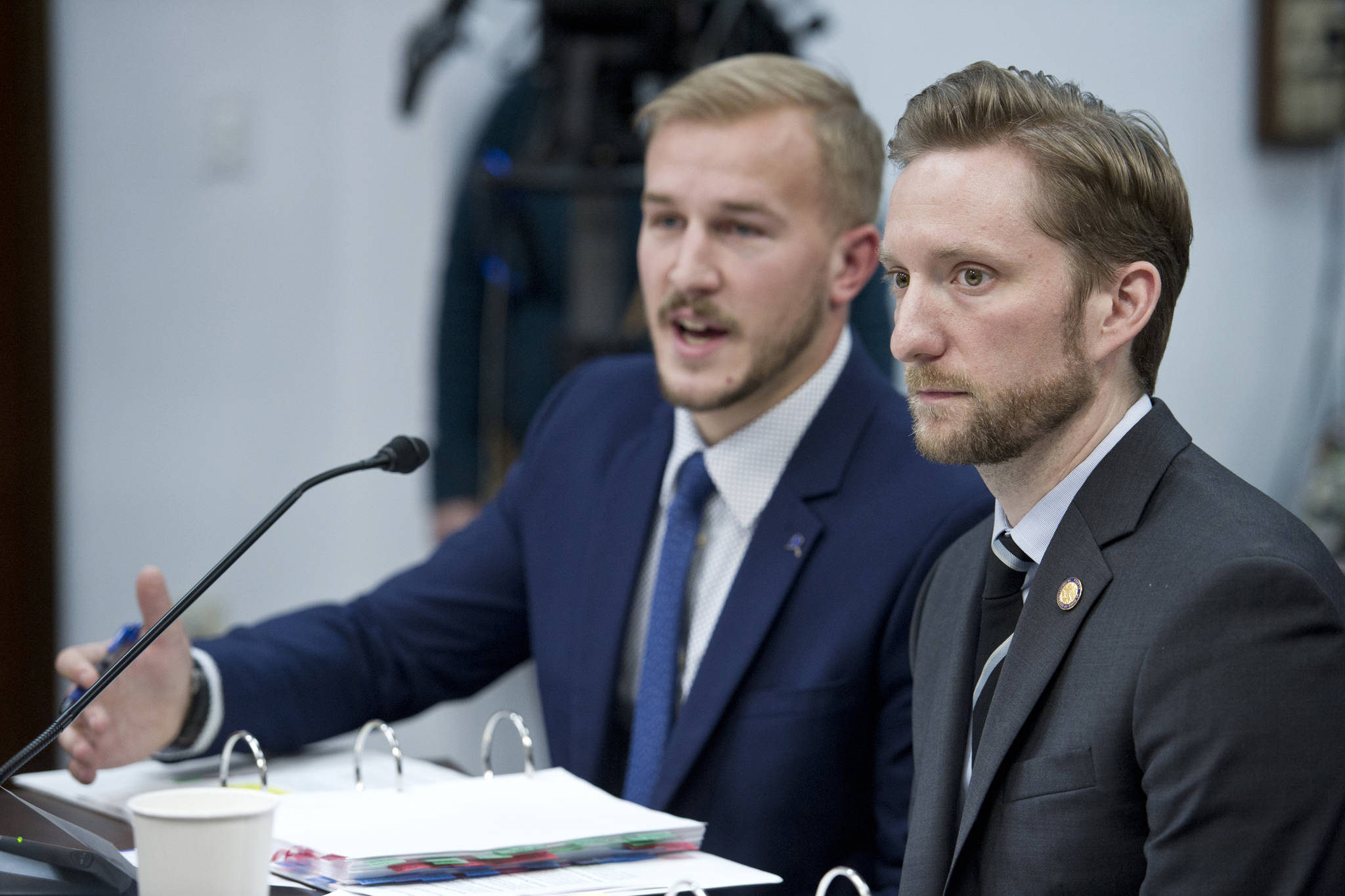 Rep. Jason Grenn, NA-Anchorage, right, and his staff Ryan Johnston, introduce HB 44 in the House Judiciary Committee at the Capitol on Friday, Jan. 24, 2017. (Michael Penn | Juneau Empire File)
