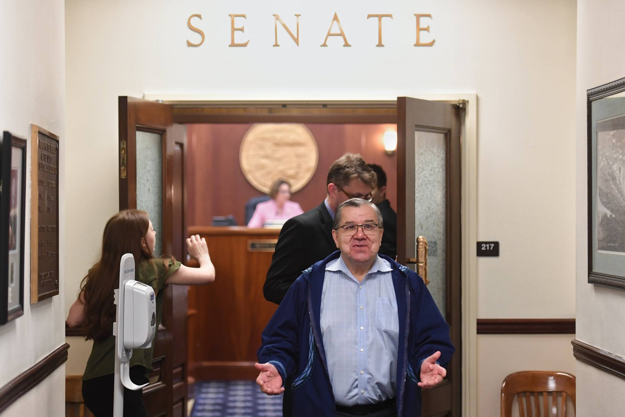 Sen. Lyman Hoffman, D-Bethel, leaves the Senate chambers after a “call” on the Senate was lifted on Thursday, June 6, 2019. Sen. Hoffman said, “Another fun day in the Senate” on his way out. (Michael Penn | Juneau Empire)