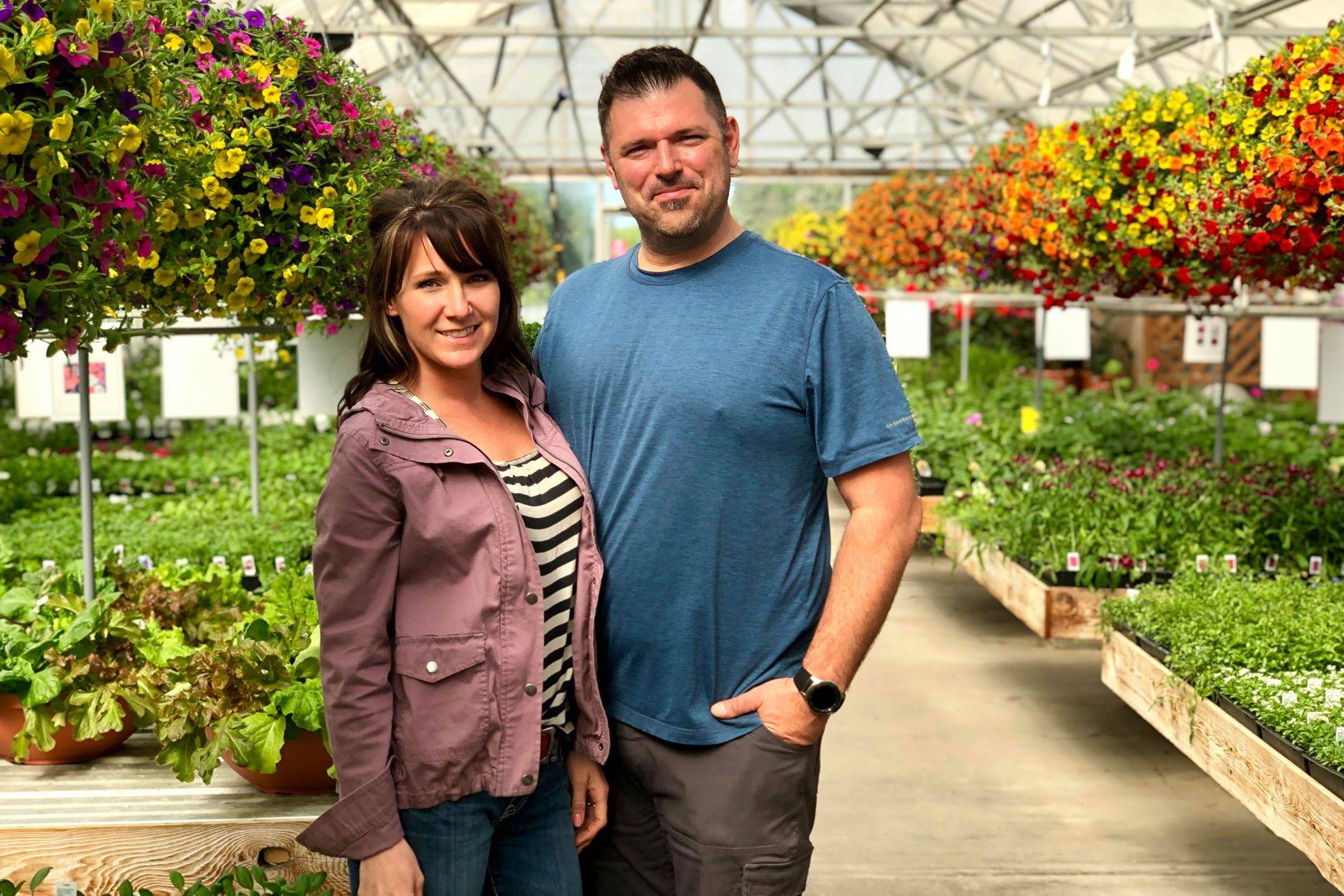Jessica and Darren Henry, who bought Trinity Greenhouse from the longtime owners in early 2018, are pictured on Monday, June 3, 2019, near Kenai, Alaska. (Photo by Victoria Petersen/Peninsula Clarion)