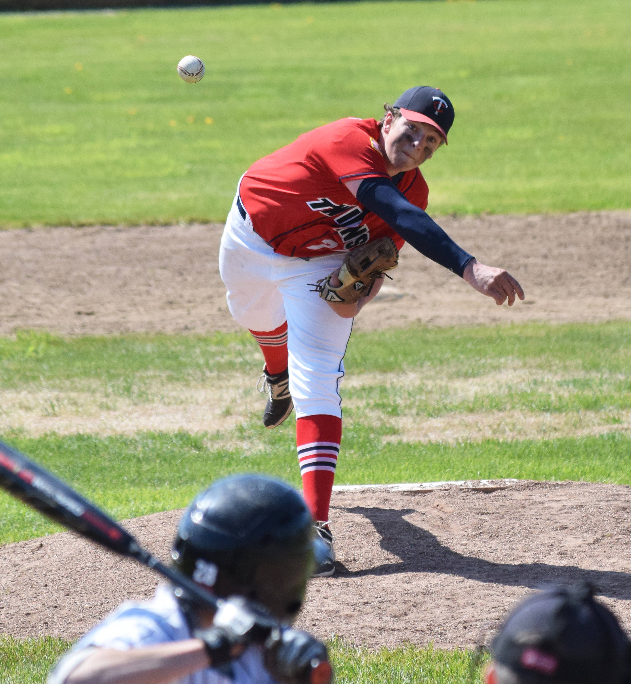 Twins pitcher Logan Smith unleashes a throw for a Chugiak batter Saturday, June 8, 2019, at Coral Seymour Memorial Park in Kenai, Alaska. (Photo by Joey Klecka/Peninsula Clarion)