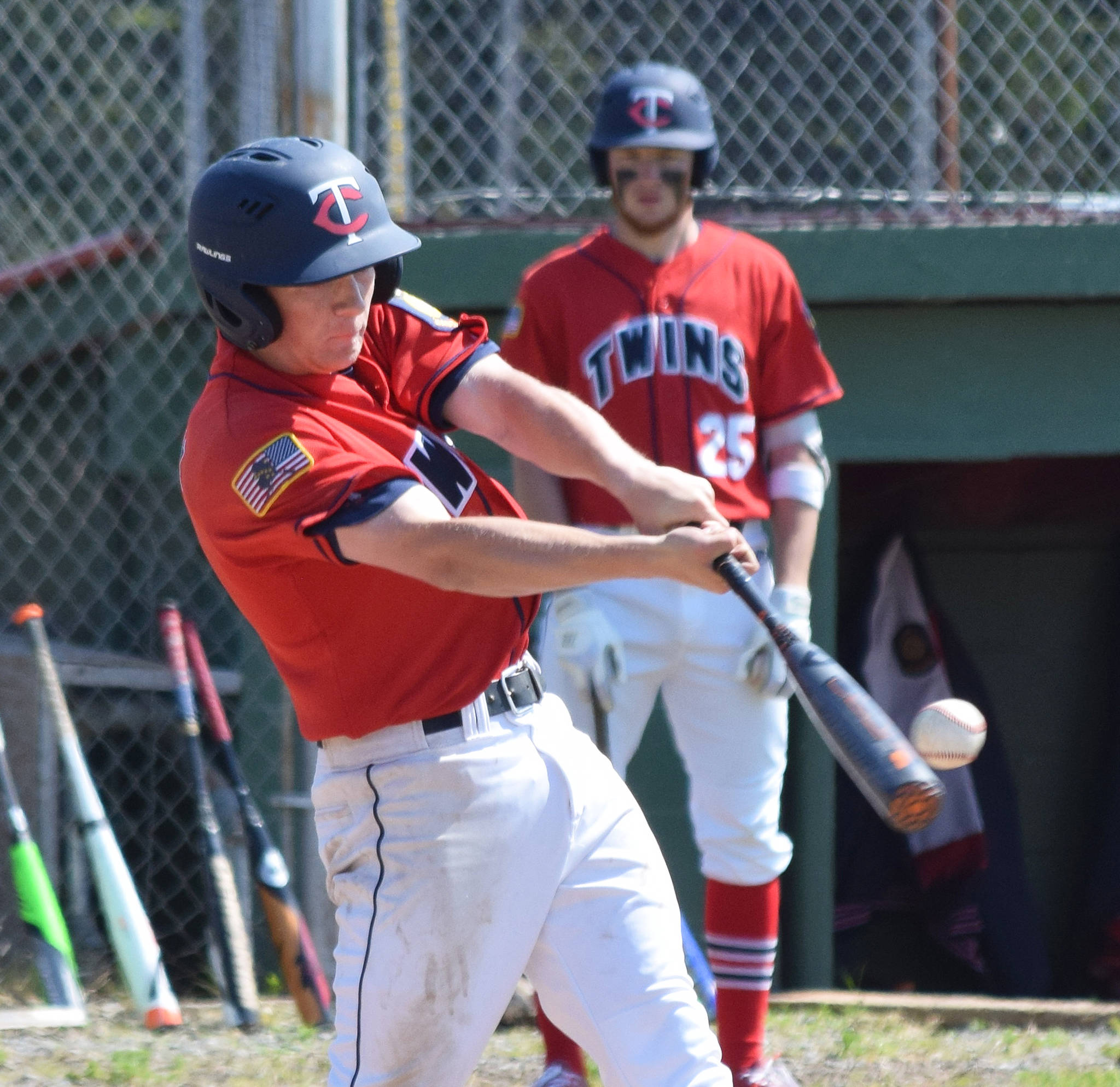 Harrison Metz makes contact for the Twins against Chugiak pitcher Sam Hall, Saturday, June 8, 2019, at Coral Seymour Memorial Park in Kenai, Alaska. (Photo by Joey Klecka/Peninsula Clarion)