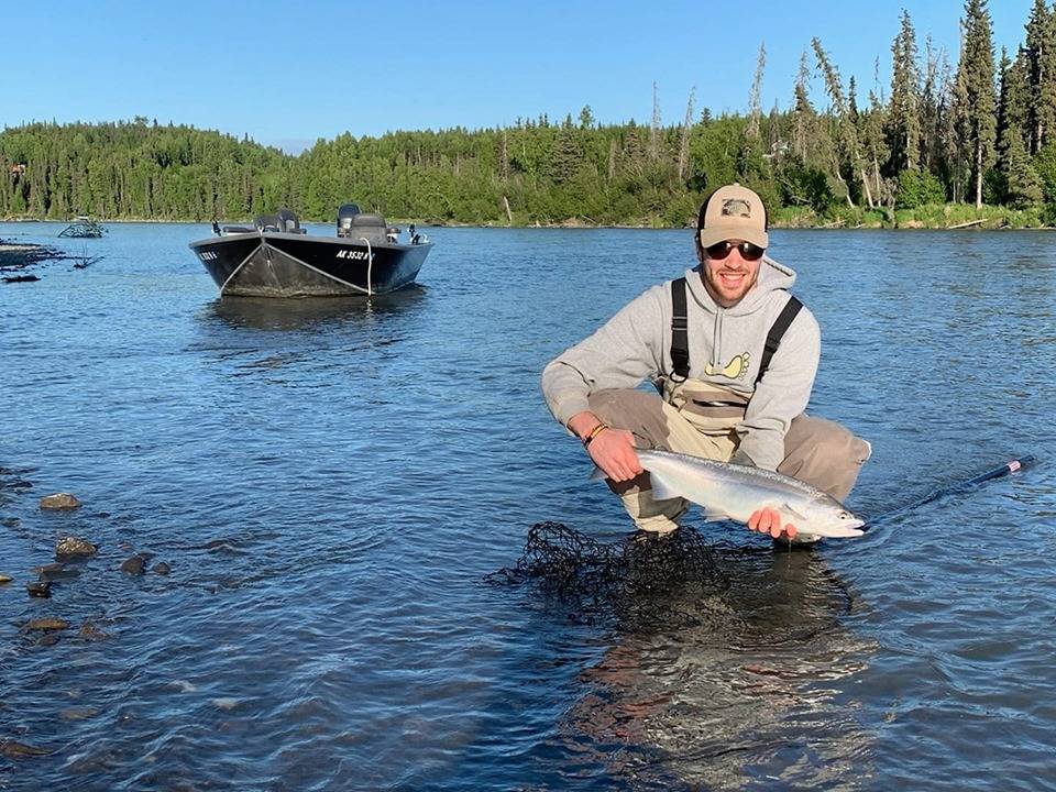 An angler shows off his early run sockeye on the Kenai River in June 2019 near Kenai, Alaska. (Photo submitted by Jason Foster)