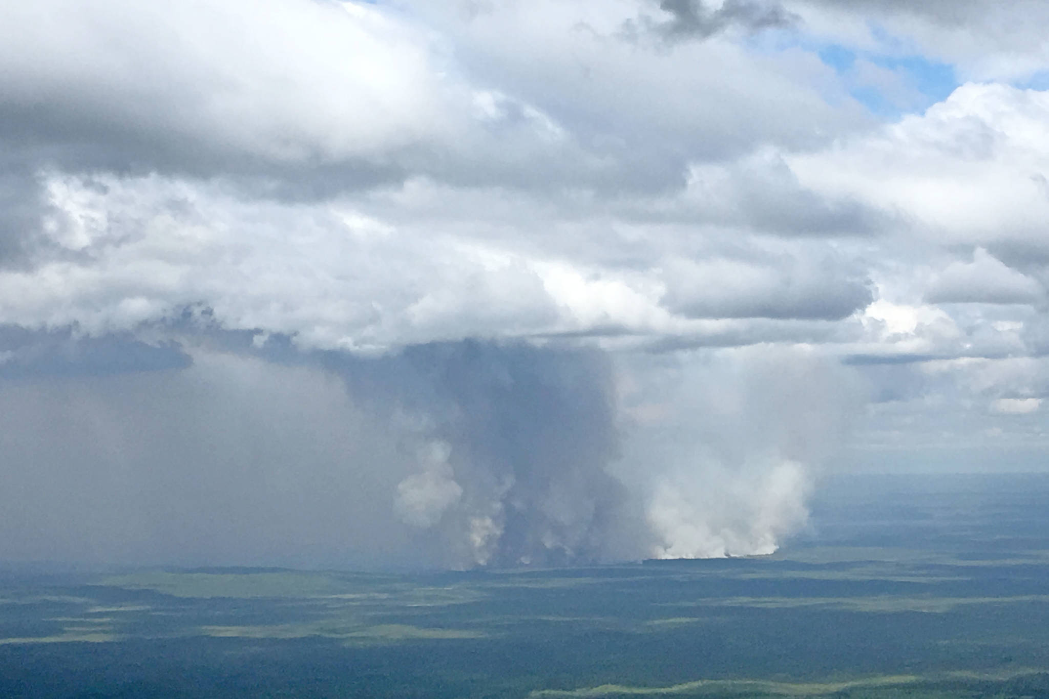 The Swan Lake Fire, as seen from the Mystery Hills, burns Wednesday, June 12, 2019, on the Kenai Peninsula in Alaska. (Photo by Jeff Helminiak/Peninsula Clarion)
