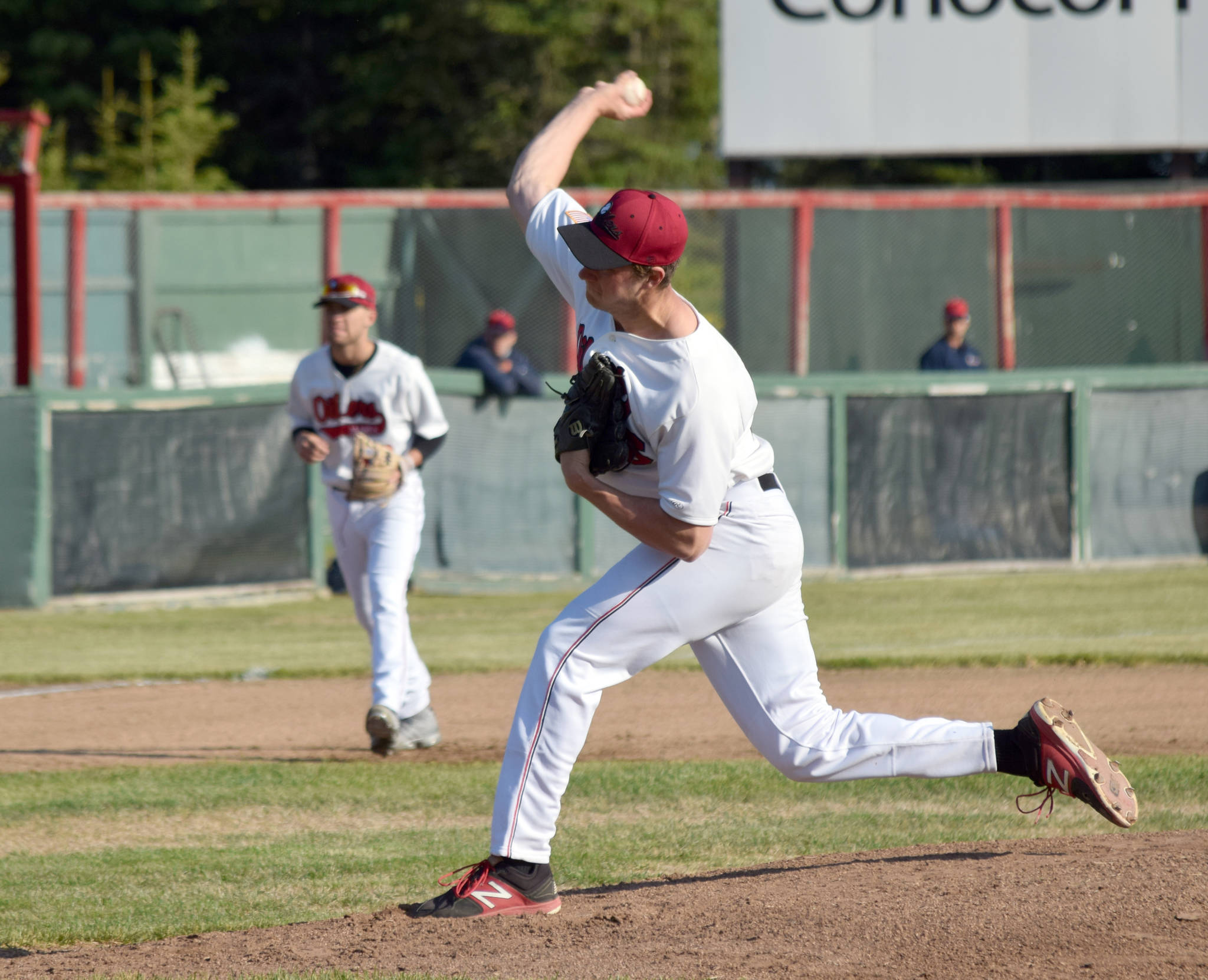 Peninsula Oilers starter Joey Becher delivers to the Chugiak-Eagle River Chinooks during the Oilers’ home opener Wednesday, June 12, 2019, at Coral Seymour Memorial Park in Kenai, Alaska. (Photo by Jeff Helminiak/Peninsula Clarion)