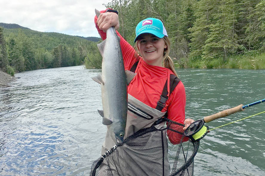 Shelby Harris shows off a sockeye caught on the Upper Kenai River on Saturday, June 15, 2019. (Photo submitted by Shelby Harris)