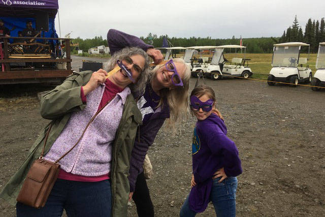 From left, Theresa Peterson, Jan Mabrey and Zoey Polacek smile for the camera during the 2018 Longest Day Golf Tournament at the Bird Homestead Golf Course in Soldotna on June 16, 2018. (Photo courtesy Cindy Harris)