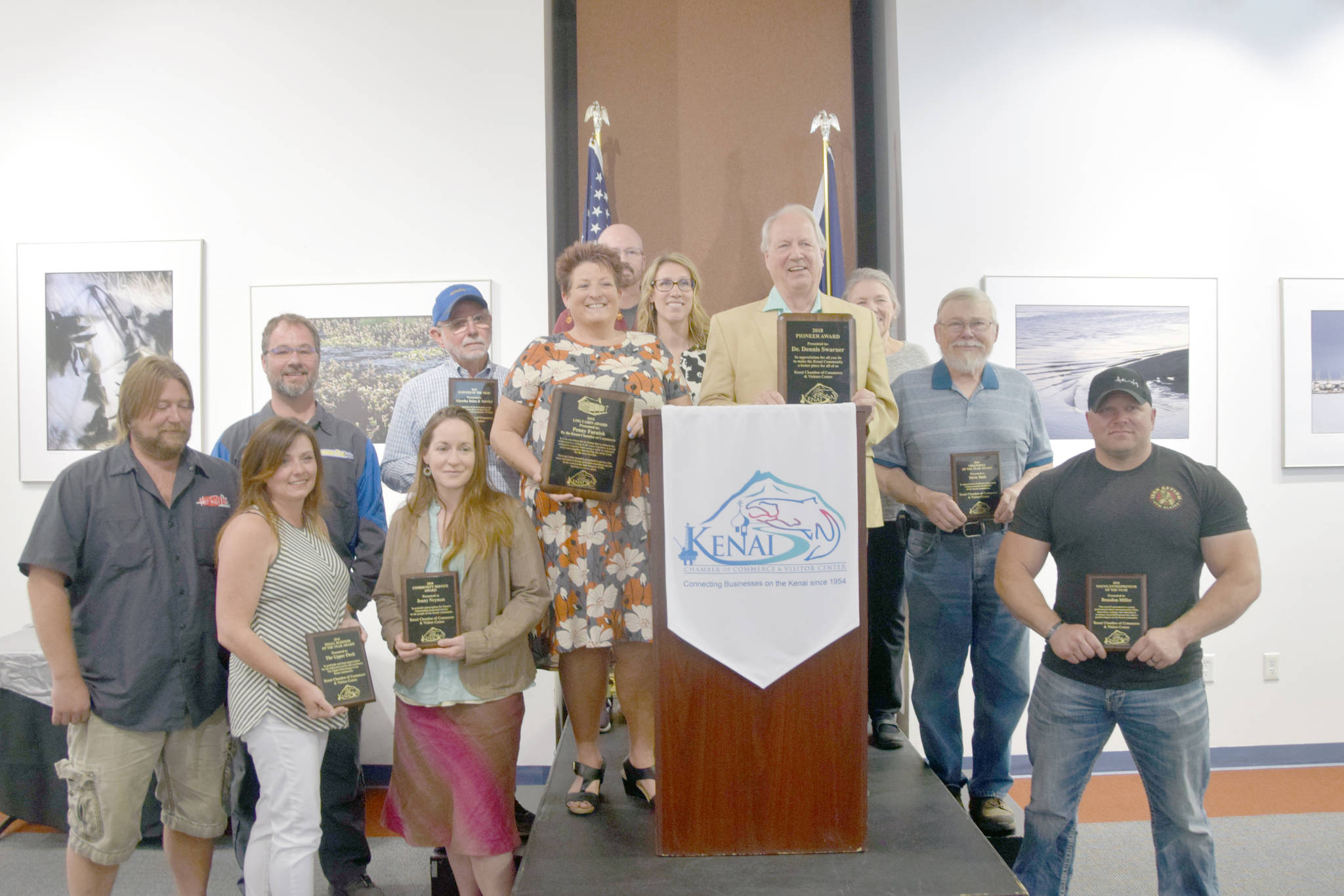 The recipients of the annual Kenai Community Awards pose for a photo during the Kenai Chamber of Commerce Luncheon at the Kenai Visitors and Cultural Center on June 19, 2019, in Kenai, Alaska. (Photo by Brian Mazurek/Peninsula Clarion)