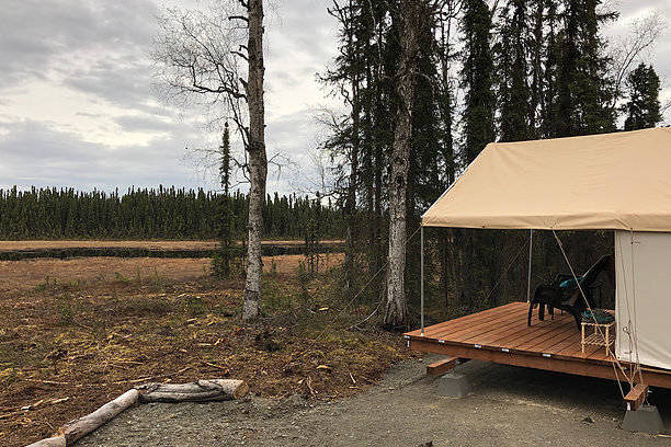 Amy George, who used to run a bed and breakfast out of her home, started offering “glamping” experiences last year. She has two luxury tents that can sleep up to four people, as seen on June 12, 2018, near Soldotna, Alaska. (Photo by Victoria Petersen/Peninsula Clarion)
