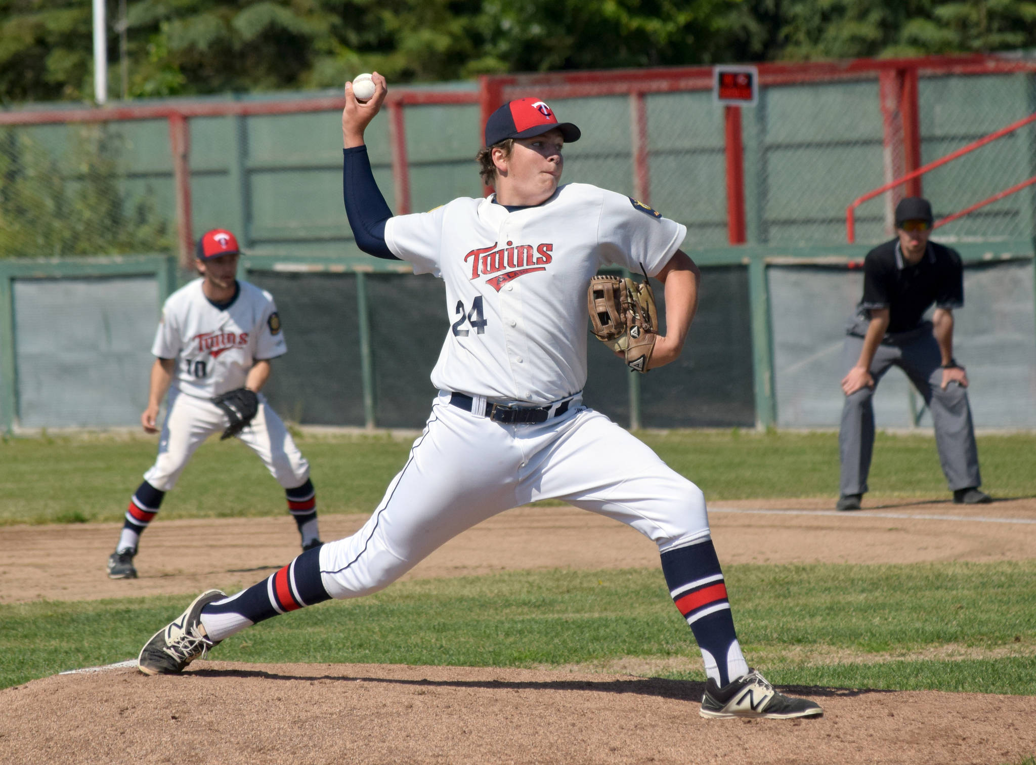Post 20 Twins pitcher Logan Smith delivers to Dimond on Sunday, June 23, 2019, at Coral Seymour Memorial Park in Kenai, Alaska. (Photo by Jeff Helminiak/Peninsula Clarion)