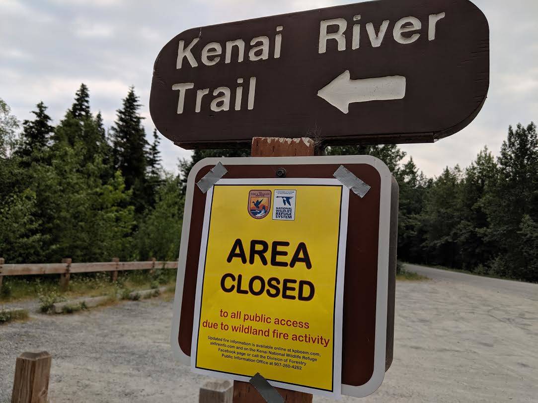 A sign for trail closures can be seen on Skilak Lake Road on Sunday, June 23, 2019. The Kenai Wildlife Refuge closed recreation areas, including Bottenintnin Lake, Watson Lake Campground, Egumen Lake Trail, Petersen Lake Campground, Kelly Campground, Seven Lakes Trail, Skyline Trail and Jean Lake Campground over the weekend. (Photo by Erin Thompson/Peninsula Clarion)