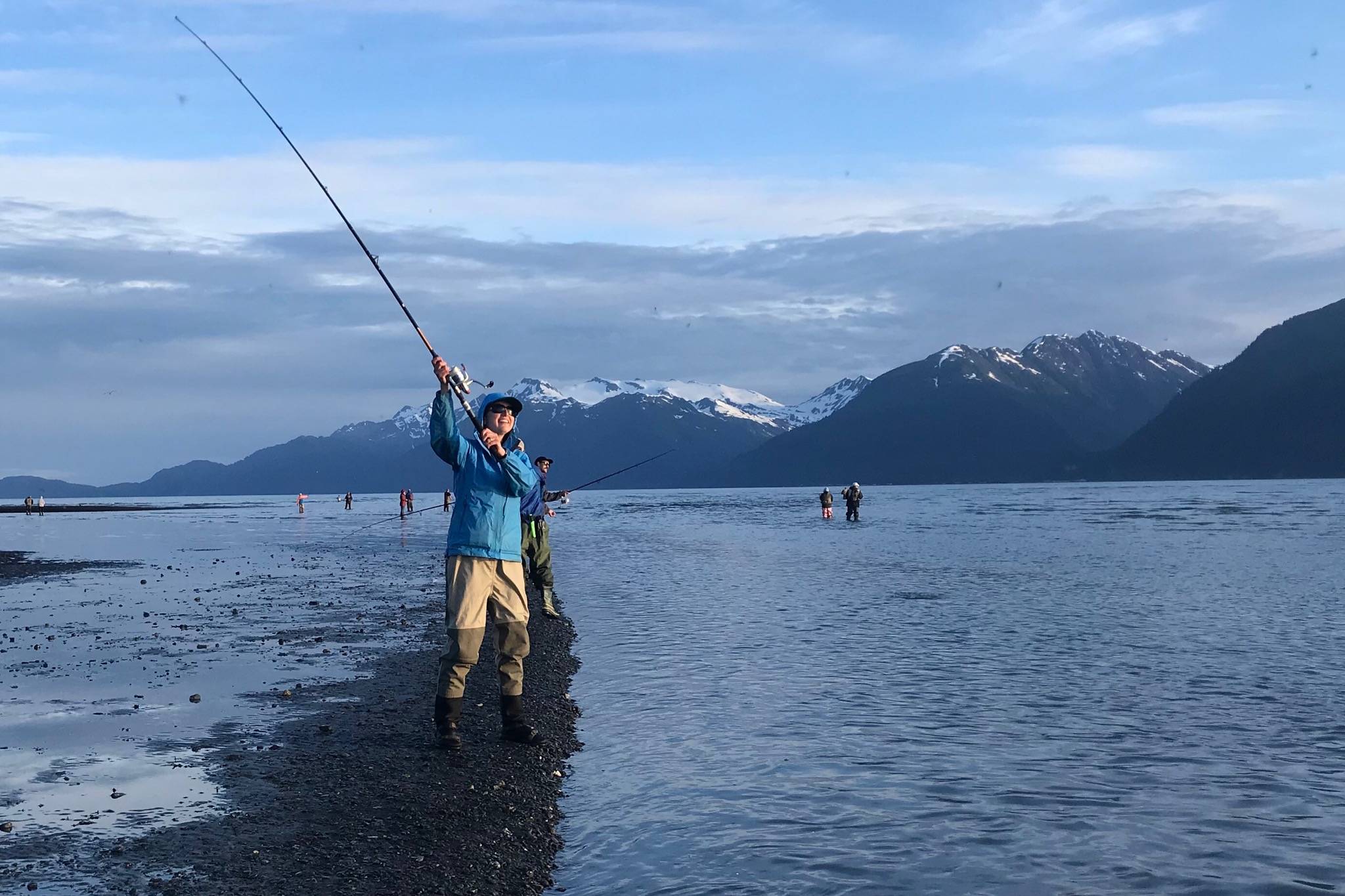 Sarah Walters of Seward snags for sockeye salmon in the saltwaters of Resurrection Bay near Seward. Snagging for salmon is only allowed in saltwater. (Photo by Kat Sorensen/Peninsula Clarion)