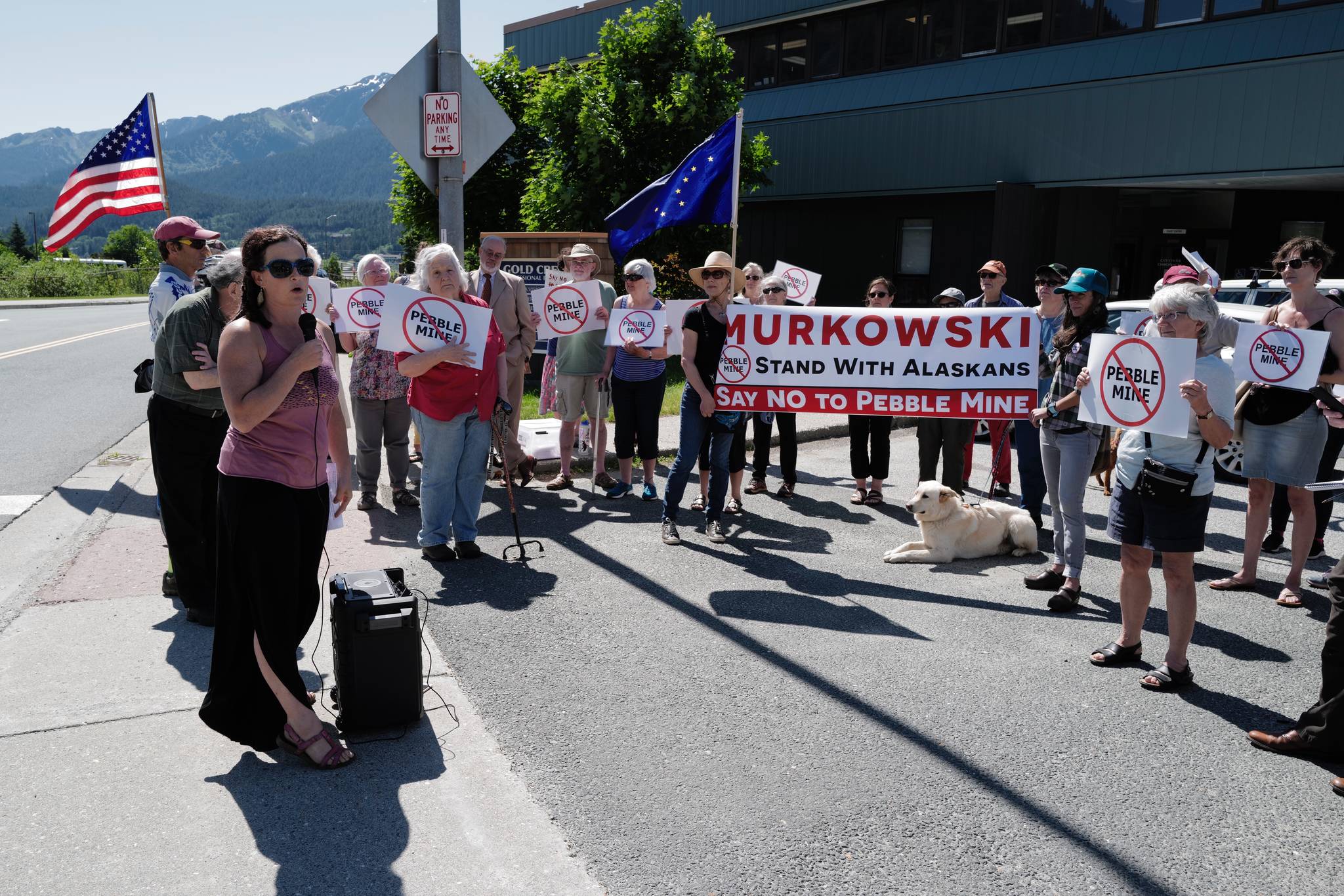 Lindsey Bloom of Salmon State gives a speech at the “No Pebble Mine” rally. (Michael Penn | Juneau Empire)