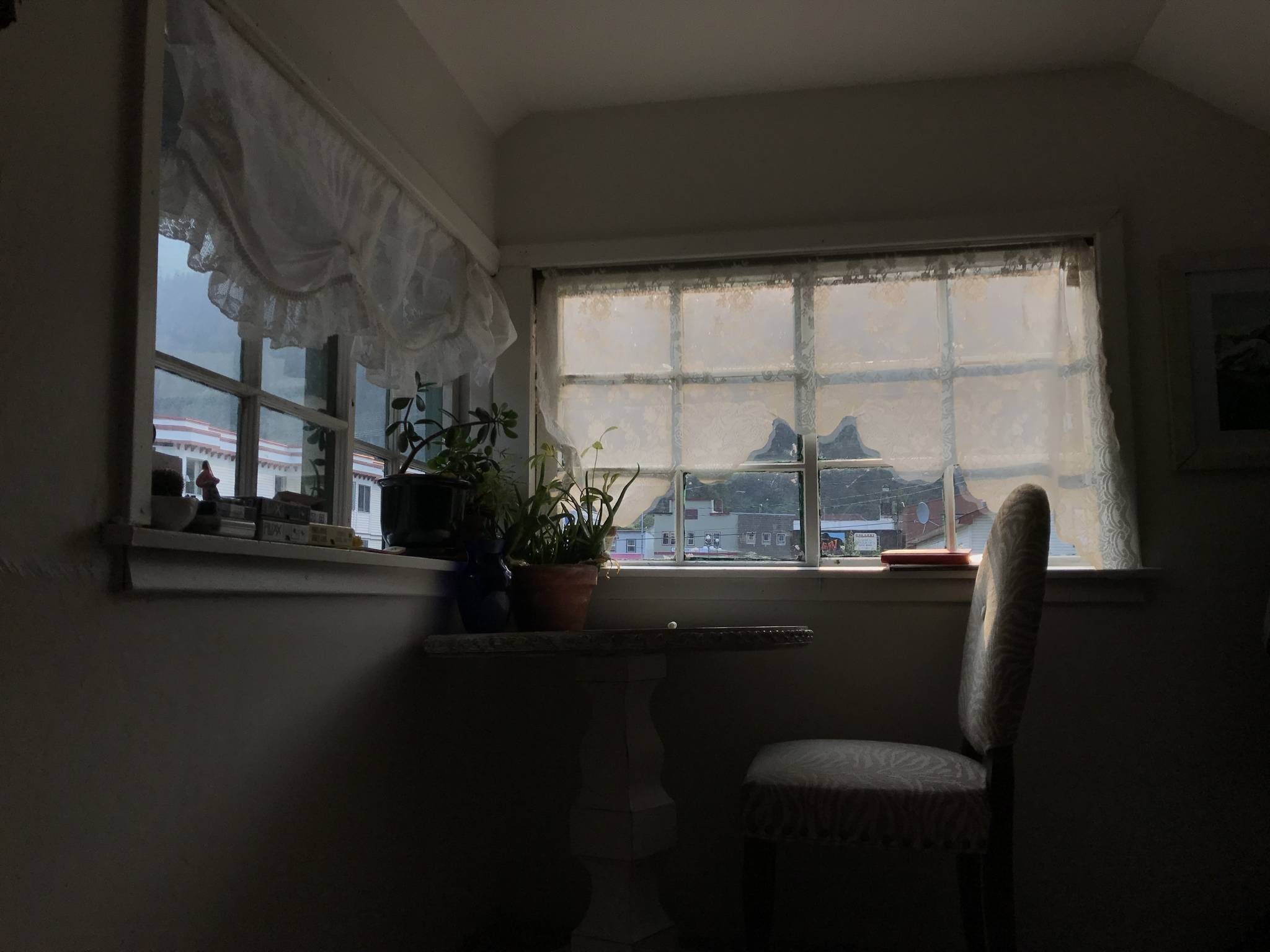 The old windows in Kat Sorensen’s apartment are painted shut from the inside and the outside which can cause some issues on hot, Alaska afternoons. (Photo by Kat Sorensen/Peninsula Clarion)