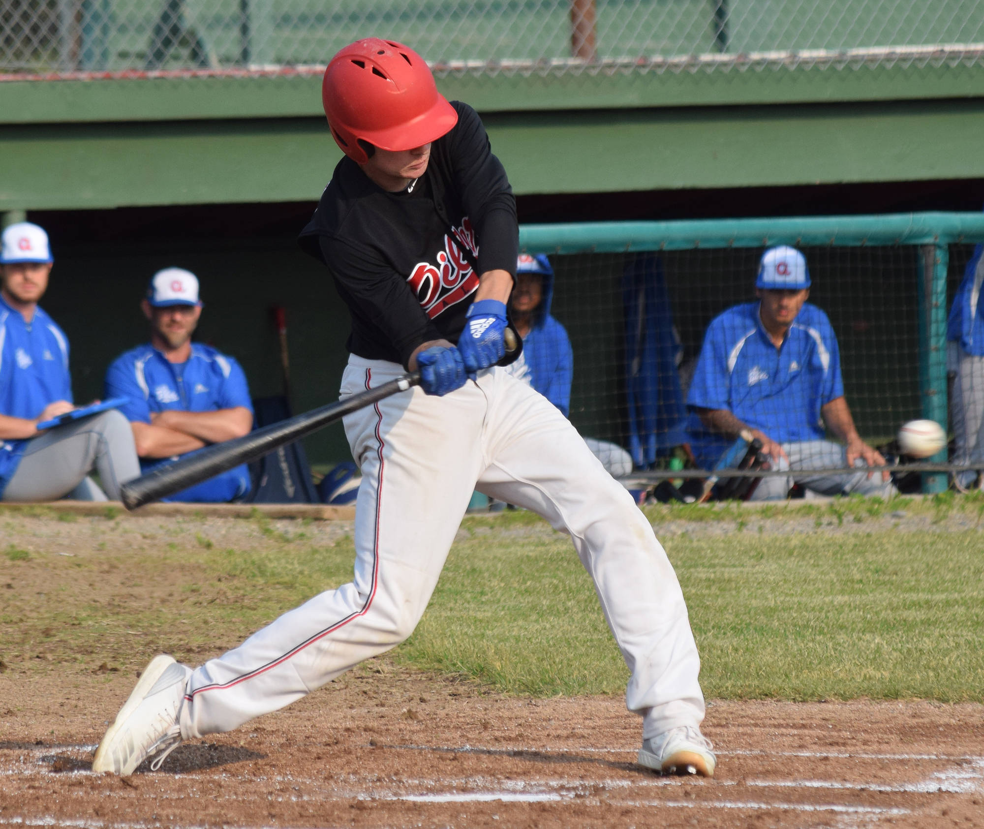 Oilers batter Travis Bohall swings at a pitch from the Anchorage Glacier Pilots Friday, June 28, 2019, at Coral Seymour Memorial Park in Kenai. (Photo by Joey Klecka/Peninsula Clarion)