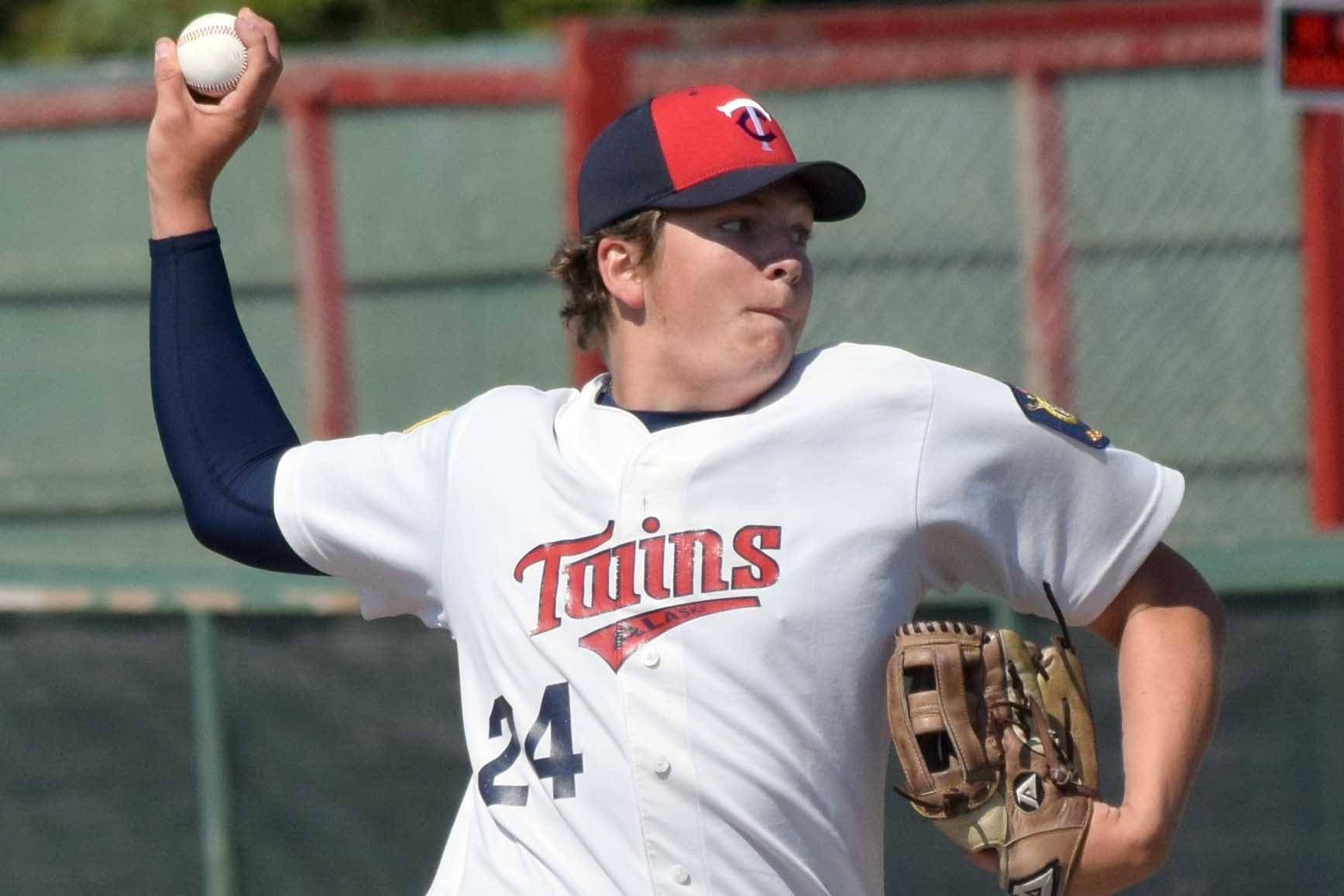 Post 20 Twins pitcher Logan Smith delivers to Dimond on Sunday, June 23, 2019, at Coral Seymour Memorial Park in Kenai, Alaska. (Photo by Jeff Helminiak/Peninsula Clarion)