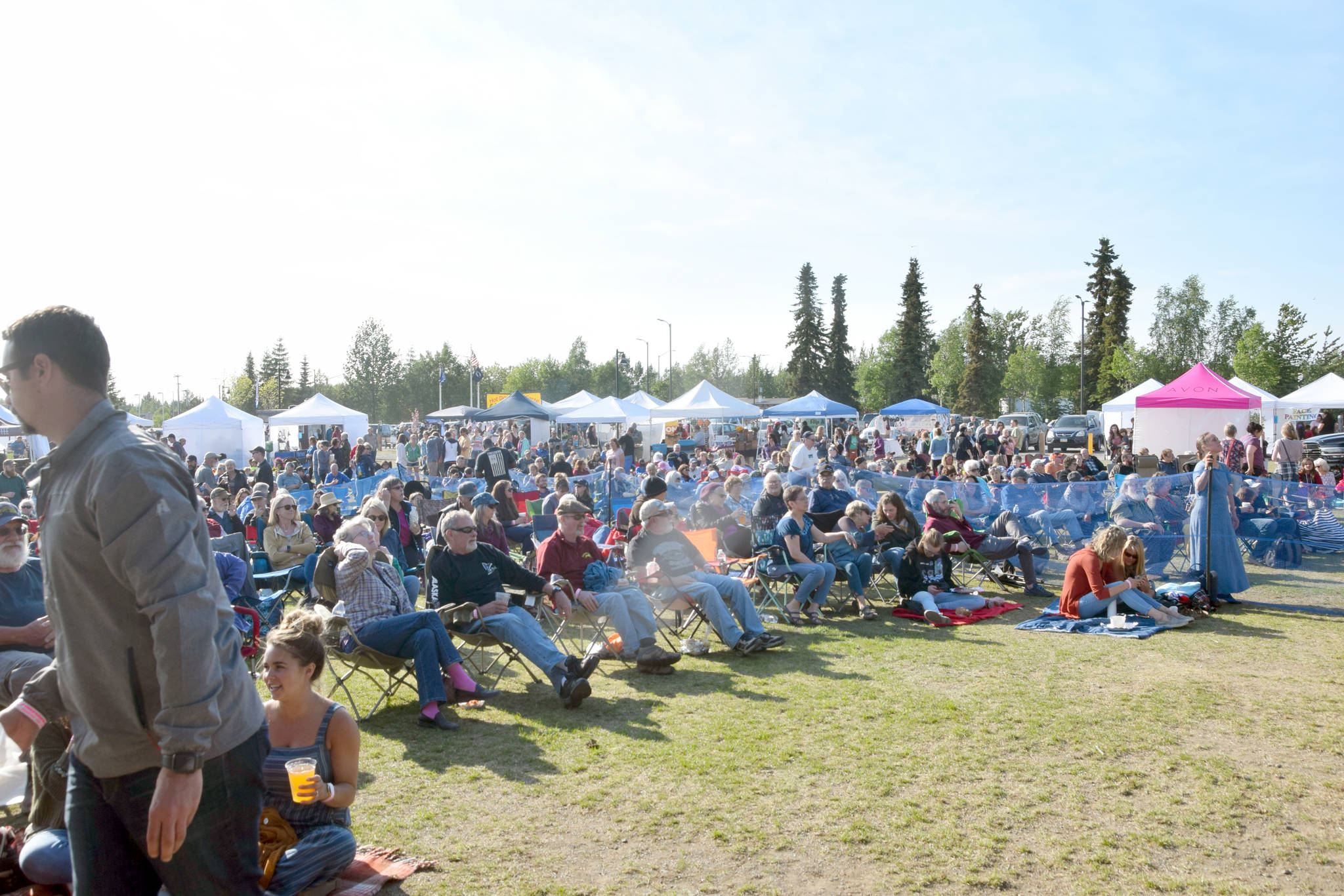 The crowd listens to the music at Soldotna Creek Park during the Levitt AMP Soldotna Music Series on Wednesday, June 12, 2019. (Photo by Brian Mazurek/Peninsula Clarion)