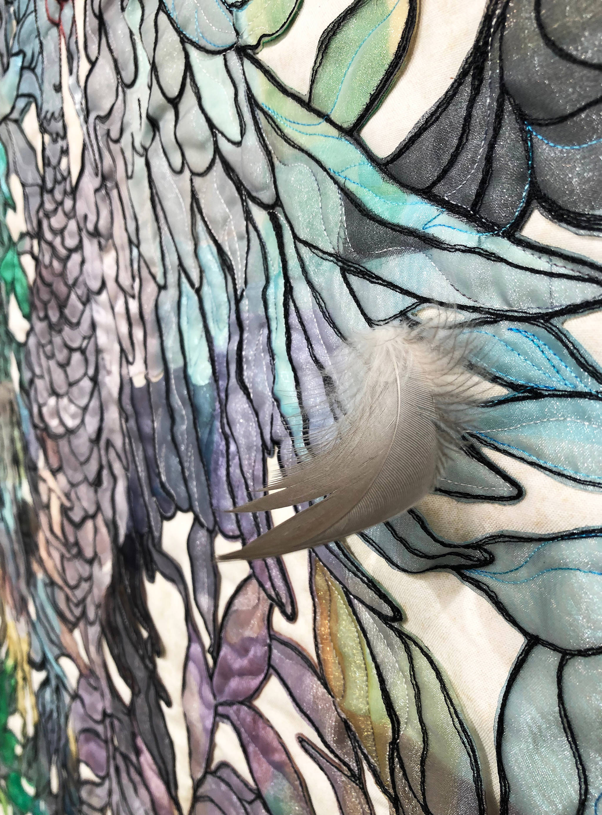 “Dancing Crane,” a quilted pattern by Chelline Larsen, hangs Tuesday at the Kenai Fine Art Center in Kenai. (Photo by Joey Klecka/Peninsula Clarion)