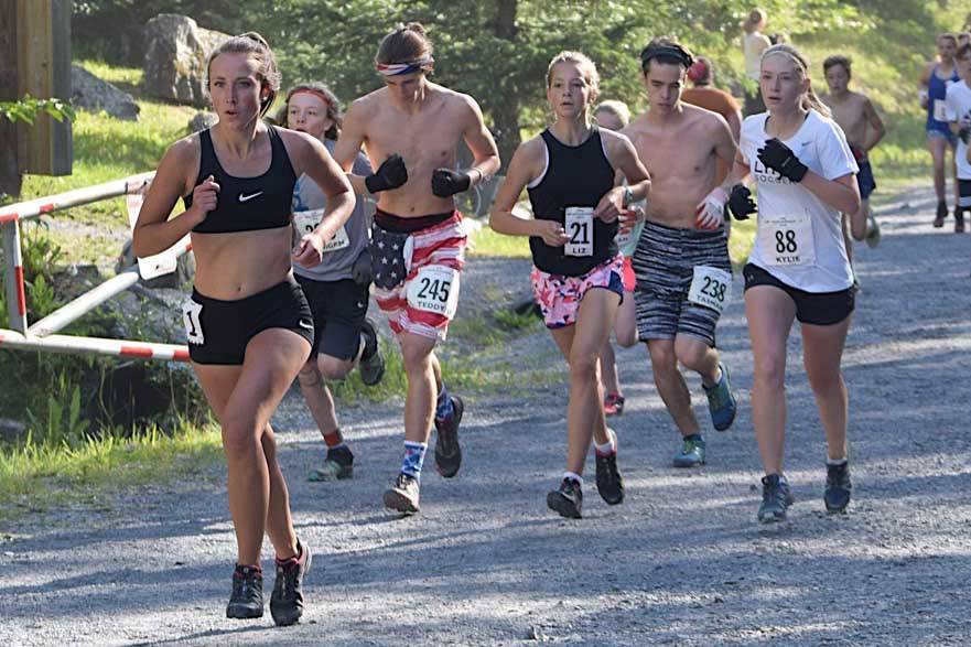 Riana Boonstra, a 2018 graduate of Kenai Central, runs in the junior race at Mount Marathon in Seward, Alaska, on July 4, 2018. (Photo by Jeff Helminiak/Peninsula Clarion)