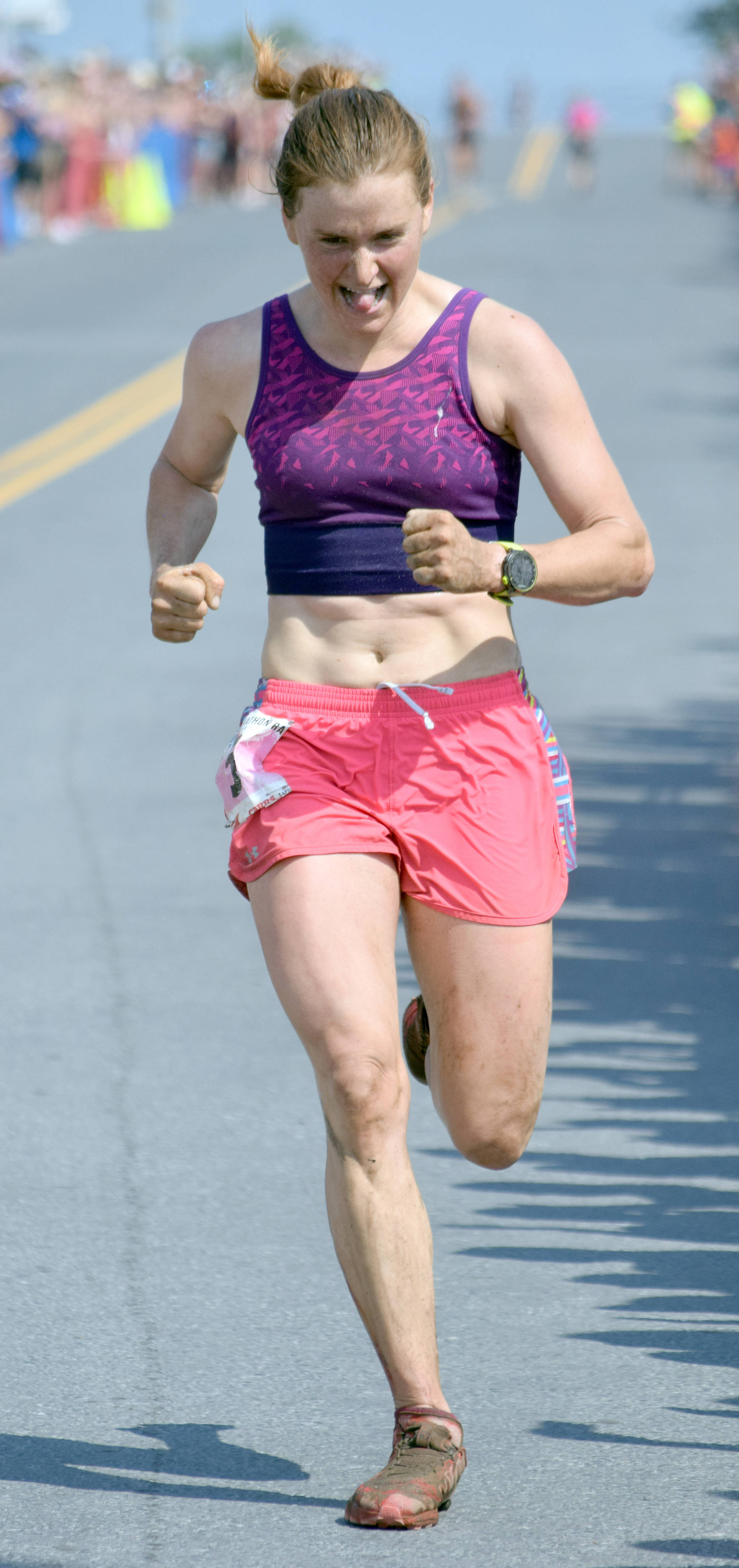 Seward’s Hannah Lafleur runs to victory Thursday, July 4, 2019, in the women’s Mount Marathon Race in Seward, Alaska. (Photo by Jeff Helminiak/Peninsula Clarion)