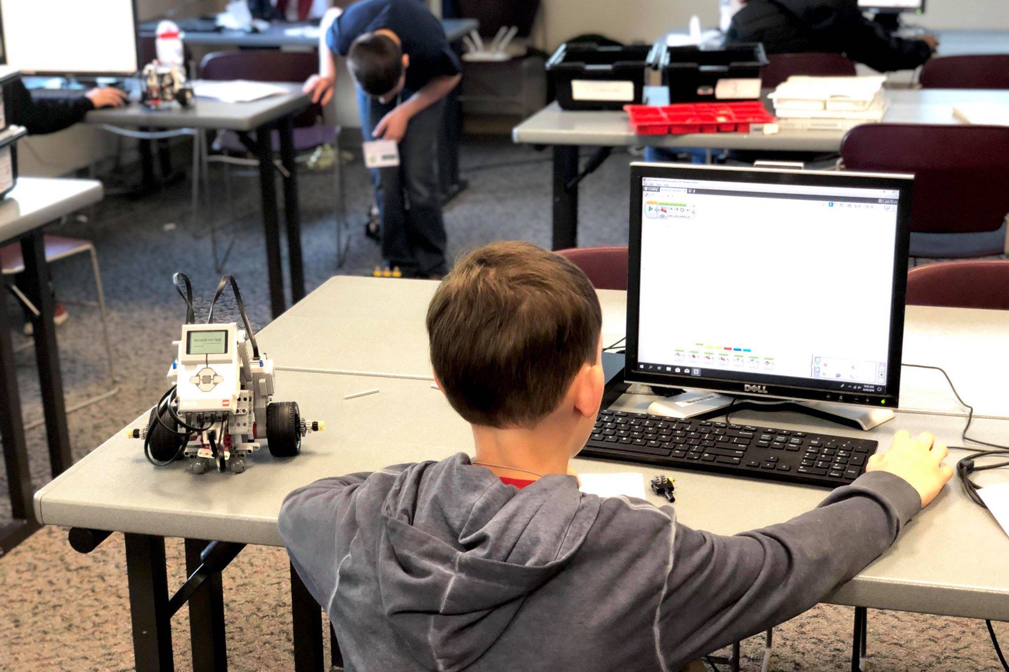 A student works on programming his Lego robot in the Lego robotics UAA College of Engineering Summer Engineering Academies, on Wednesday, June 26, 2019, at the Kenai Peninsula College near Soldotna, Alaska. (Photo by Victoria Petersen/Peninsula Clarion)