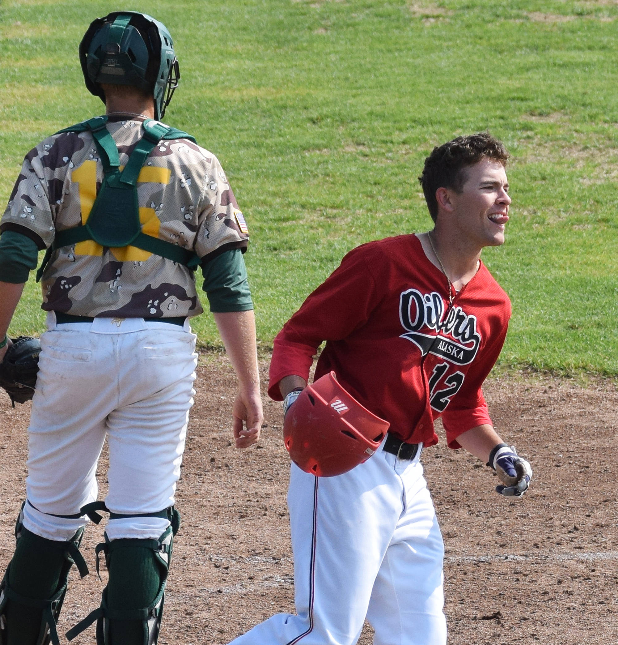 Peninsula Oilers pinchhitter Bobby Goodloe celebrates after scoring the winning run Sunday, July 7, 2019, against the Mat-Su Miners at Coral Seymour Memorial Park in Kenai, Alaska. (Photo by Joey Klecka/Peninsula Clarion)