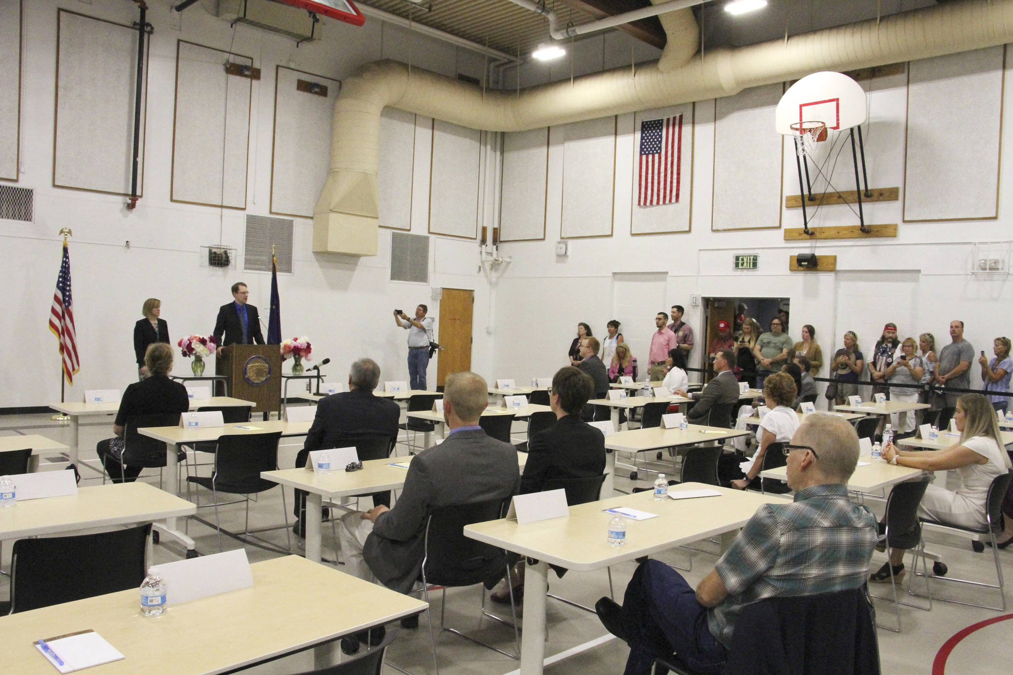 Lawmakers meet in a gym at Wasilla Middle School, where a legislative session was held Monday, in Wasilla. (AP Photo/Mark Thiessen)