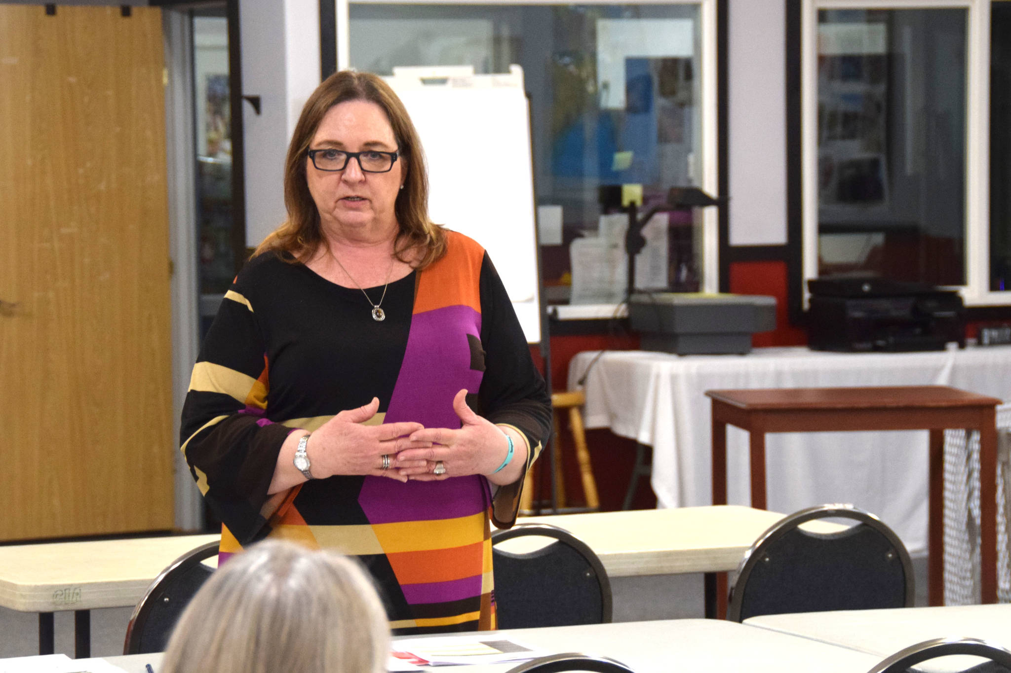 Love, INC Executive Director Leslie Rohr speaks to members of a workgroup looking to acquire a permanent emergency shelter on the Kenai Peninsula at Love, INC in Soldotna on Feb. 11. (Photo by Brian Mazurek/Peninsula Clarion)                                Love, INC Executive Director Leslie Rohr speaks to members of a workgroup looking to acquire a permanent emergency shelter on the Kenai Peninsula at Love, INC in Soldotna, Alaska on Feb. 11, 2019. (Photo by Brian Mazurek/Peninsula Clarion)