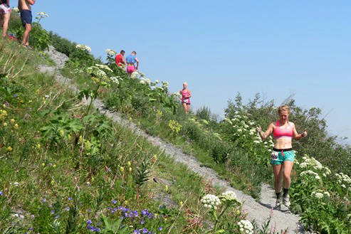 Kat Sorensen runs along a crossover trail on the descent on July 4, 2019, during the 92nd Mount Marathon Race in Seward, Alaska. (Photo courtesy of Kat Sorensen)