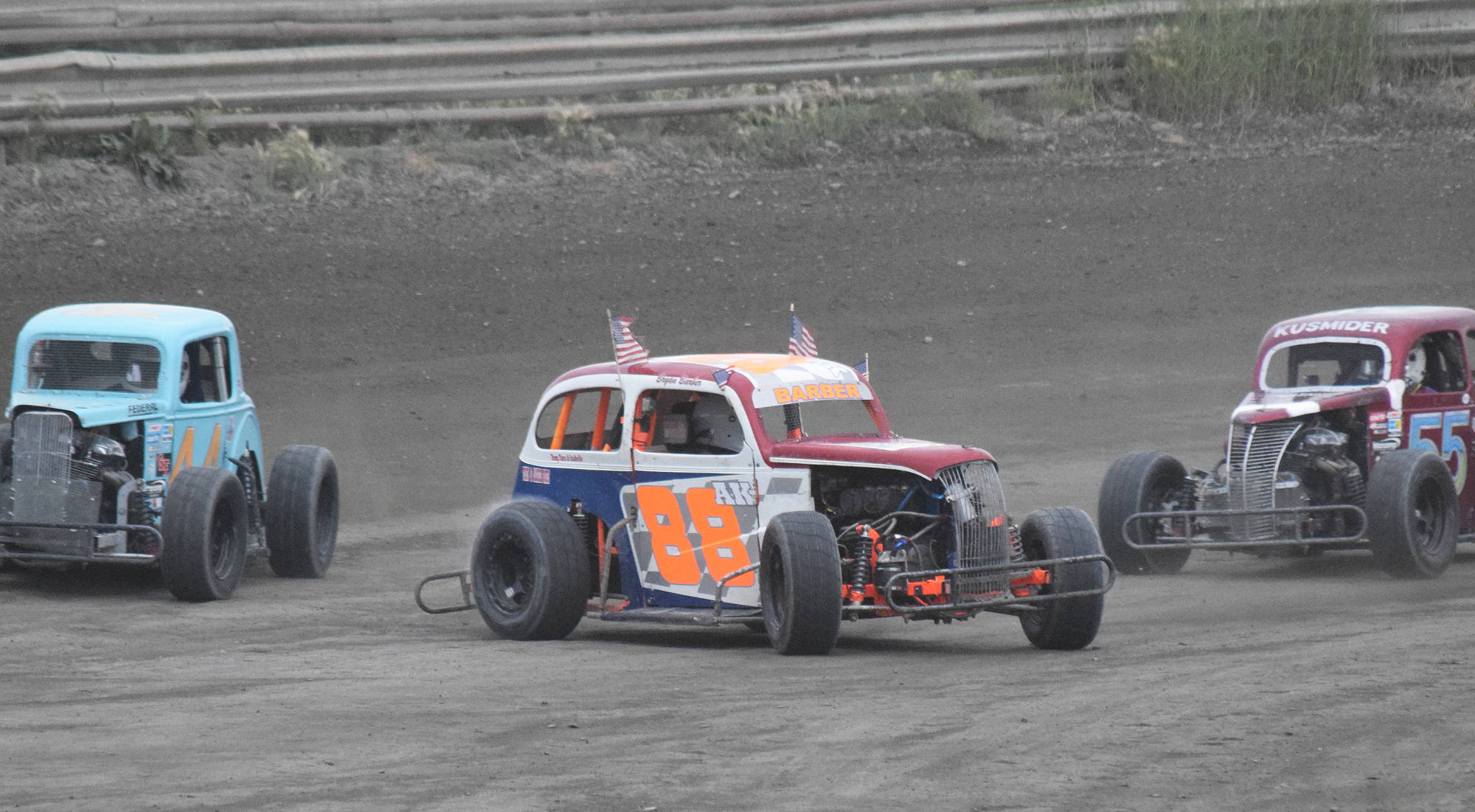 Bryan Barber (88) spins out in front of the field Saturday, July 13, 2019, early in the Legends feature race at Twin City Raceway in Kenai, Alaska. (Photo by Joey Klecka/Peninsula Clarion)