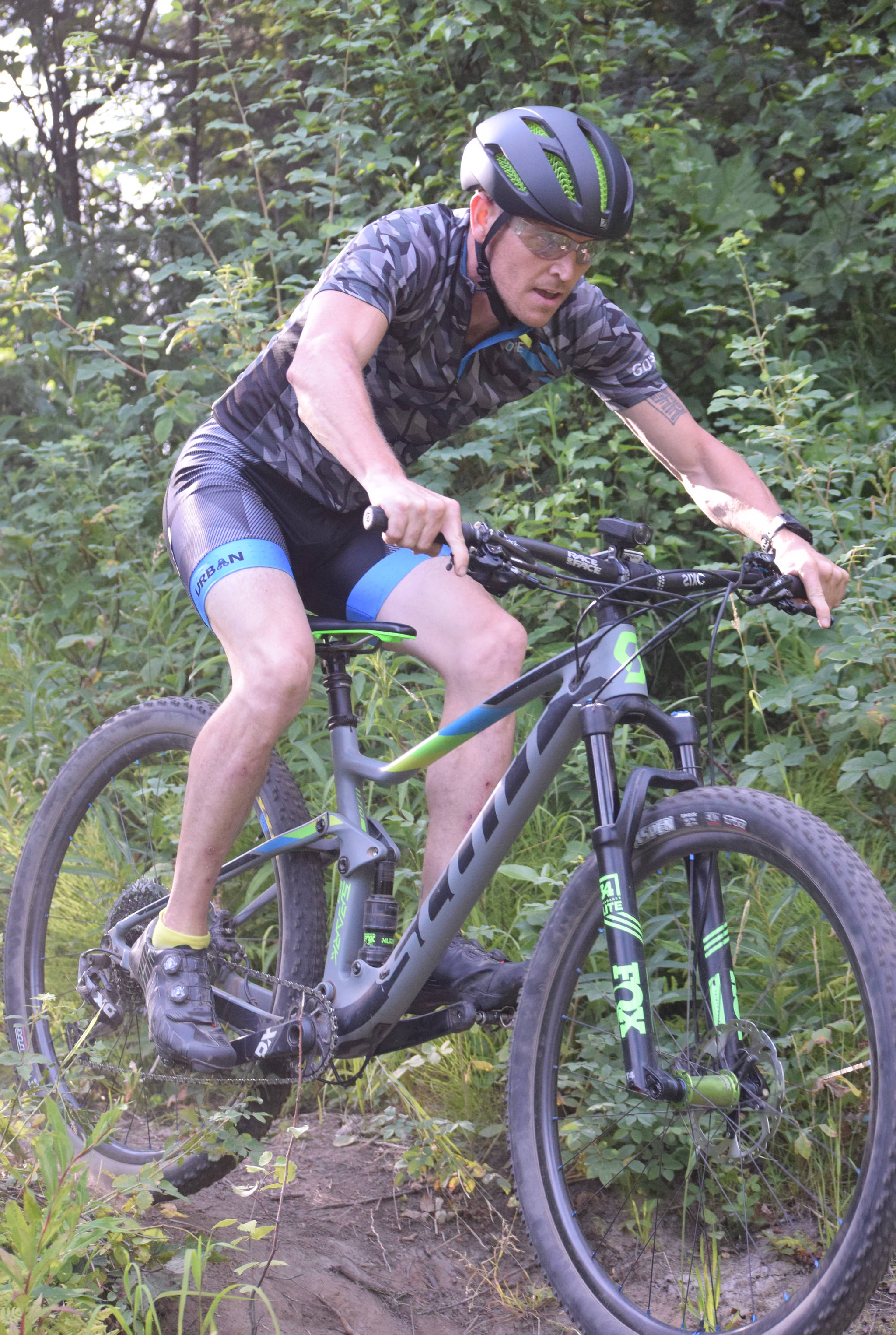 Mike Crawford negotiates a drop during Week 3 of the Soldotna Cycle Series on Thursday, July 18, 2019, at Tsalteshi Trails. (Photo by Jeff Helminiak/Peninsula Clarion)