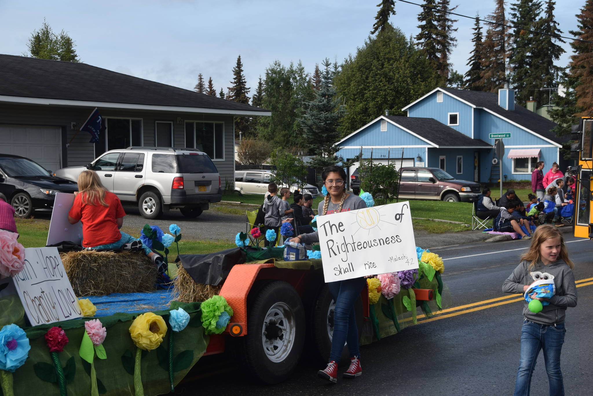 Volunteers from the Our Lady of Perpetual Help Catholic Church smile for the camera during Soldotna’s Progress Day Parade in Soldotna, Alaska on July 27, 2019. (Photo by Brian Mazurek/Peninsula Clarion)                                Volunteers from the Our Lady of Perpetual Help Catholic Church smile for the camera during Soldotna’s Progress Day Parade in Soldotna, Alaska on July 27, 2019. (Photo by Brian Mazurek/Peninsula Clarion)