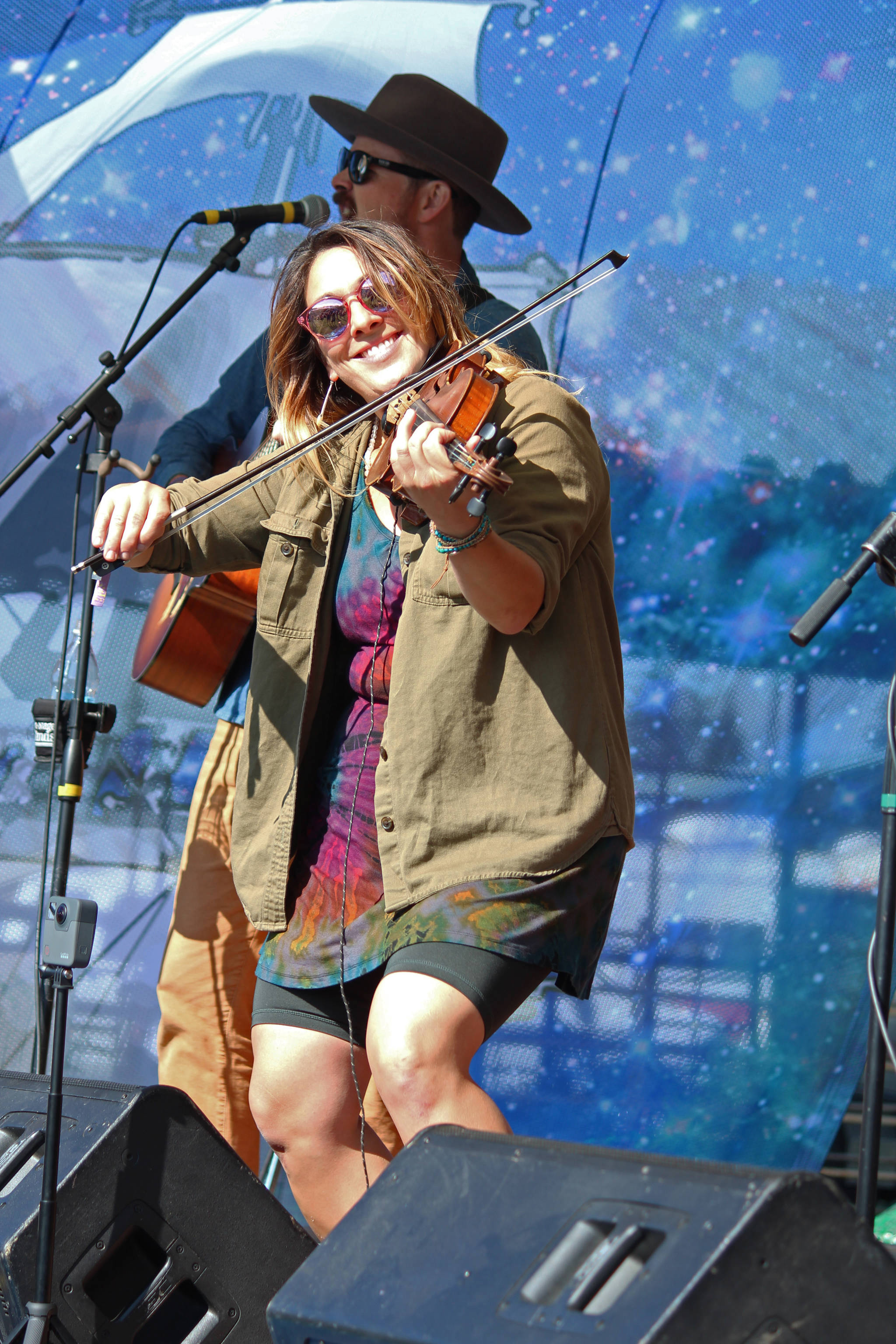 Nicole Campanale, fiddle player for Seward band Blackwater Railroad Company, performs with the band on the River Stage on Friday, Aug. 2, 2019 at Salmonfest in Ninilchik, Alaska. (Photo by Megan Pacer/Homer New