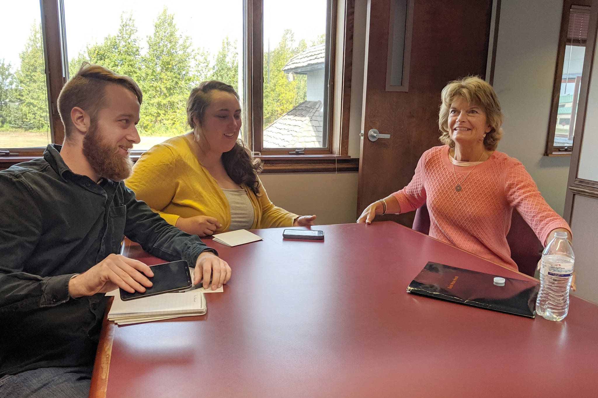 Clarion reporters Brian Mazurek, left, and Victoria Petersen interview Sen. Lisa Murkowski, R-Alaska, at the Peninsula Clarion in Kenai, Alaska, on Wednesday, Aug. 14, 2019. Murkowski discussed issues such as the Alaska Permanent Fund dividend, the Pebble Mine project and Alaska-related legislation. (Photo by Erin Thompson/Peninsula Clarion)