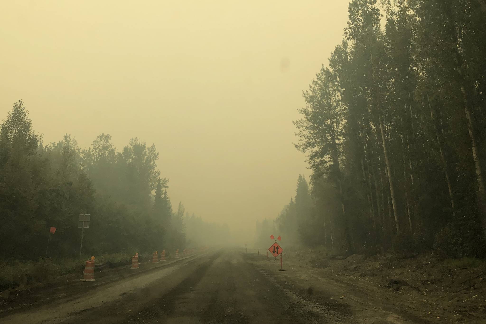 Smoke from the Swan Lake Fire impairs visibility on the Sterling Highway on Aug. 20, 2019. (Photo by Victoria Petersen/Peninsula Clarion)