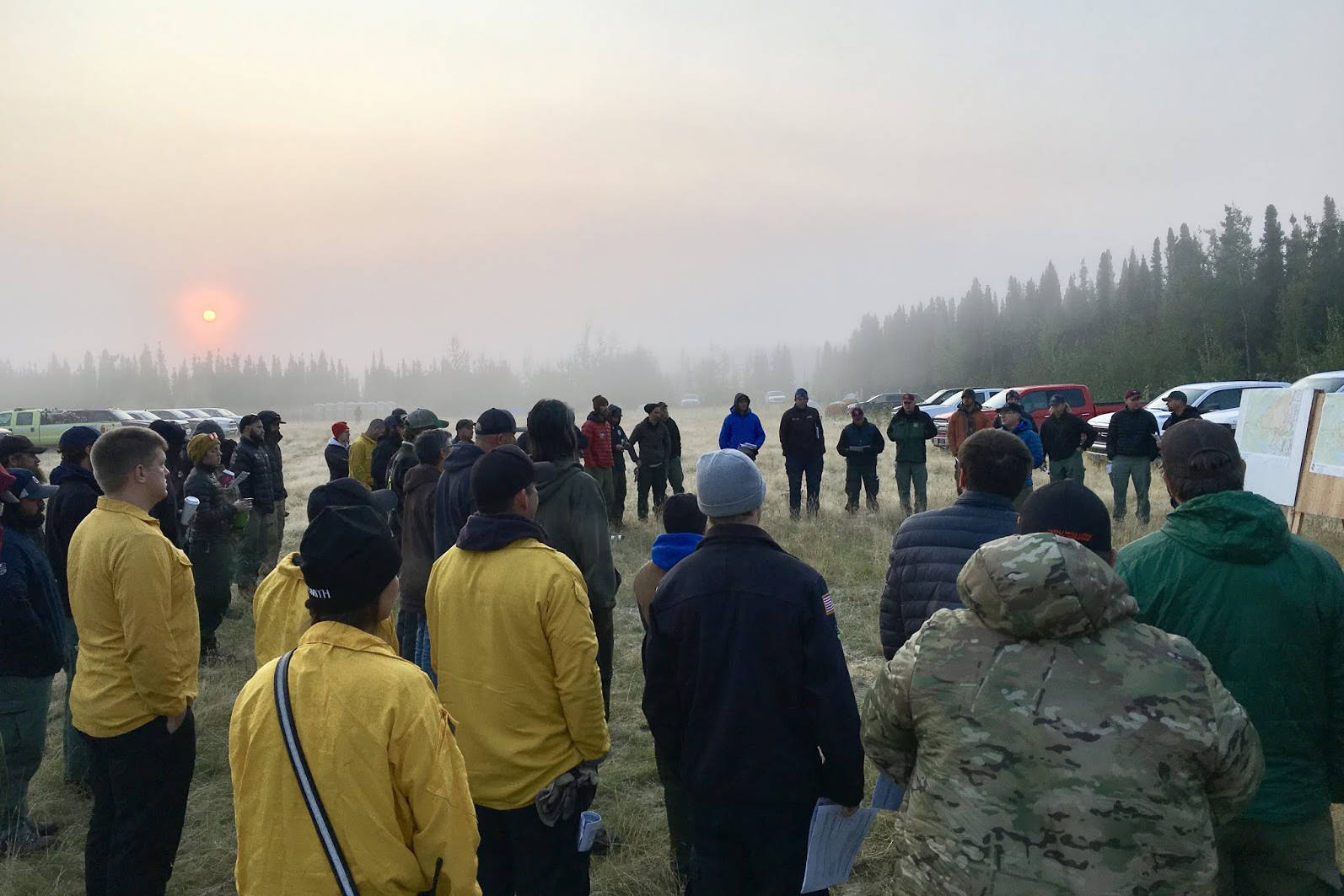 Fire crews are briefed on the day’s operations at the Otter Creek Spike Camp on Aug. 21, 2019. (Courtesy Kenai Peninsula Borough Office of Emergency Management)