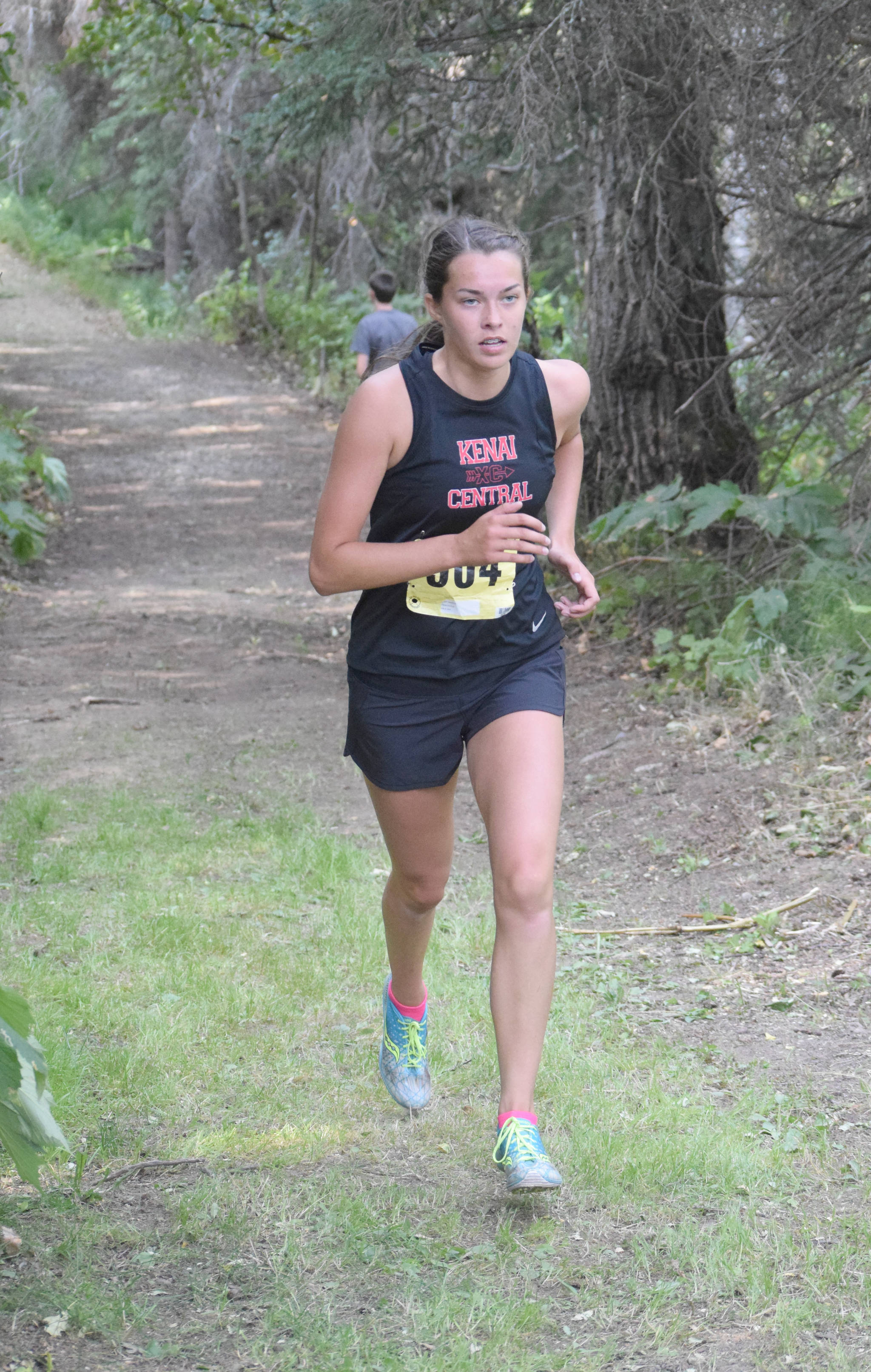 Kenai Central sophomore Logan Satathite runs to victory Monday, Aug. 19, 2019, at the Nikiski Class Races in Nikiski, Alaska. (Photo by Jeff Helminiak/Peninsula Clarion)