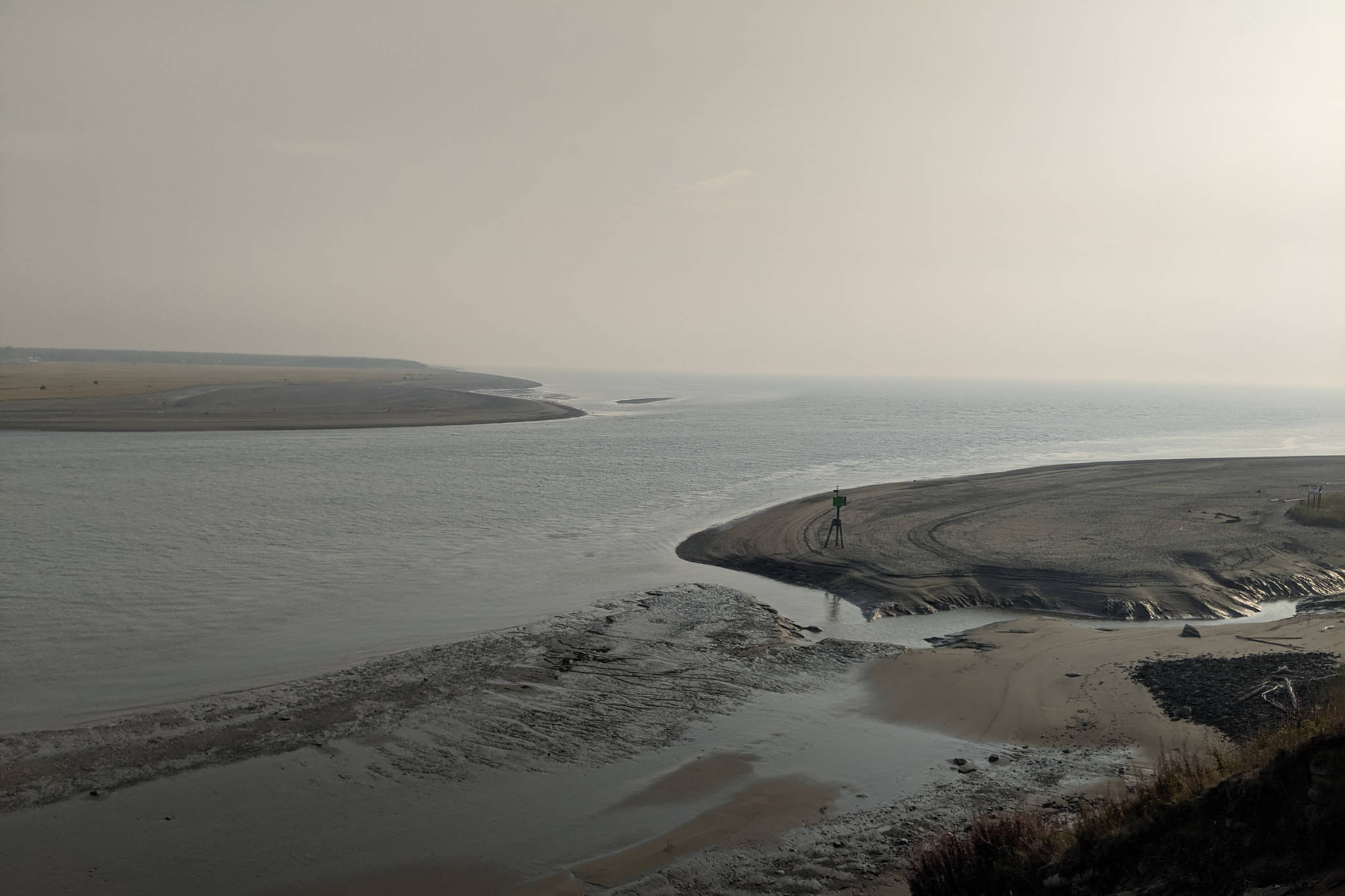 Haze from the Swan Lake Fire can be seen from the Kenai Bluffs in Old Town Kenai on Monday, Aug. 26, 2019, in Kenai, Alaska. (Photo by Erin Thompson/Peninsula Clarion)