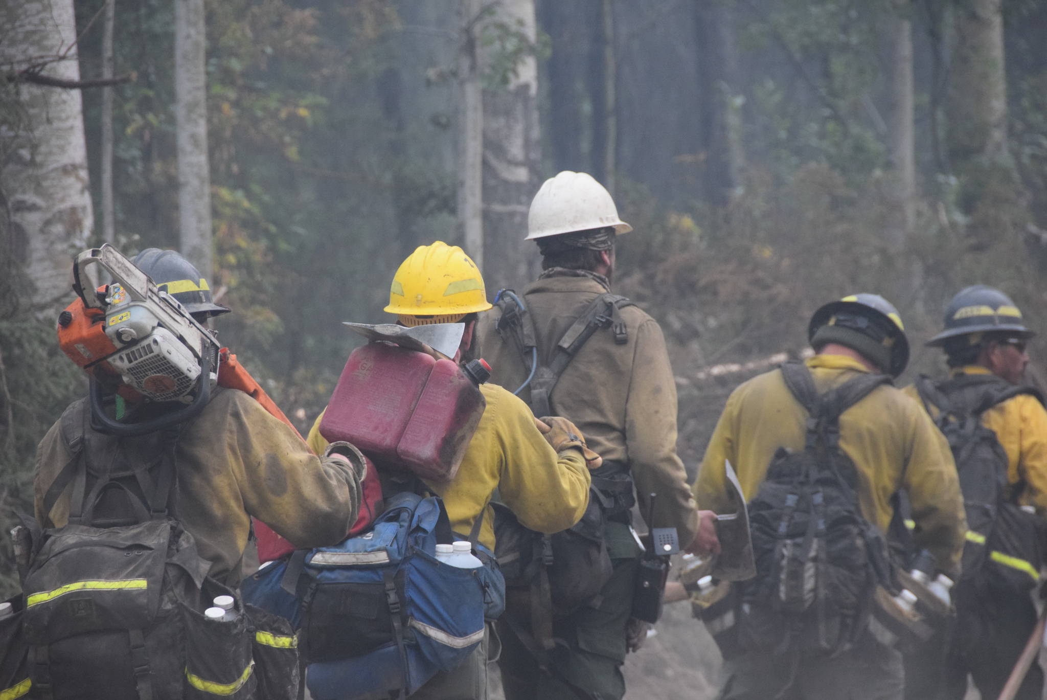 Firefighters from the Snake River Valley head out to their assignment expanding a containment line off of Skilak Lake Road southeast of Sterling, Alaska on Aug. 30, 2019. (Photo by Brian Mazurek/Peninsula Clarion)