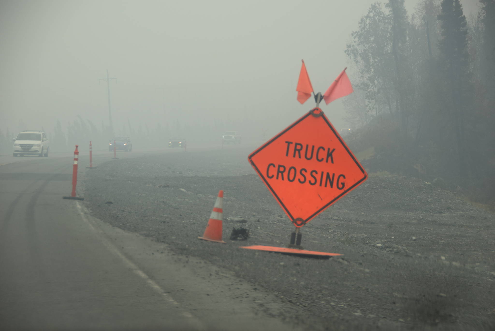 Smoke from the Swan Lake Fire has led to poor visibility along the Sterling Highway as seen here on Aug. 30, 2019. (Photo by Brian Mazurek/Peninsula Clarion)