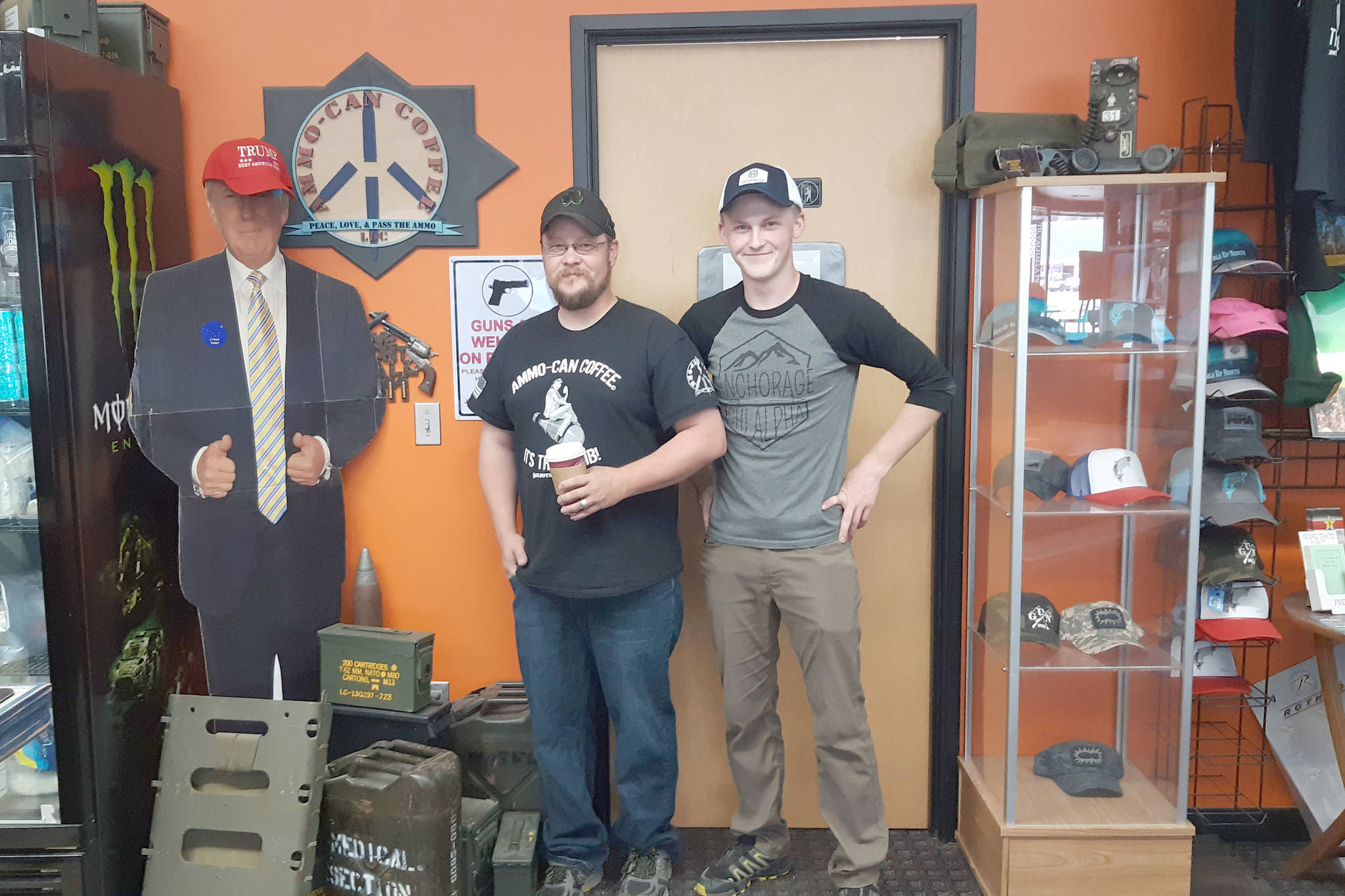 Brian Mazurek / Peninsula Clarion                                Ammo Can Coffee owner Jason Floyd (left) and his son, Liam, are seen here Aug. 16 at their coffee shop in Soldotna.