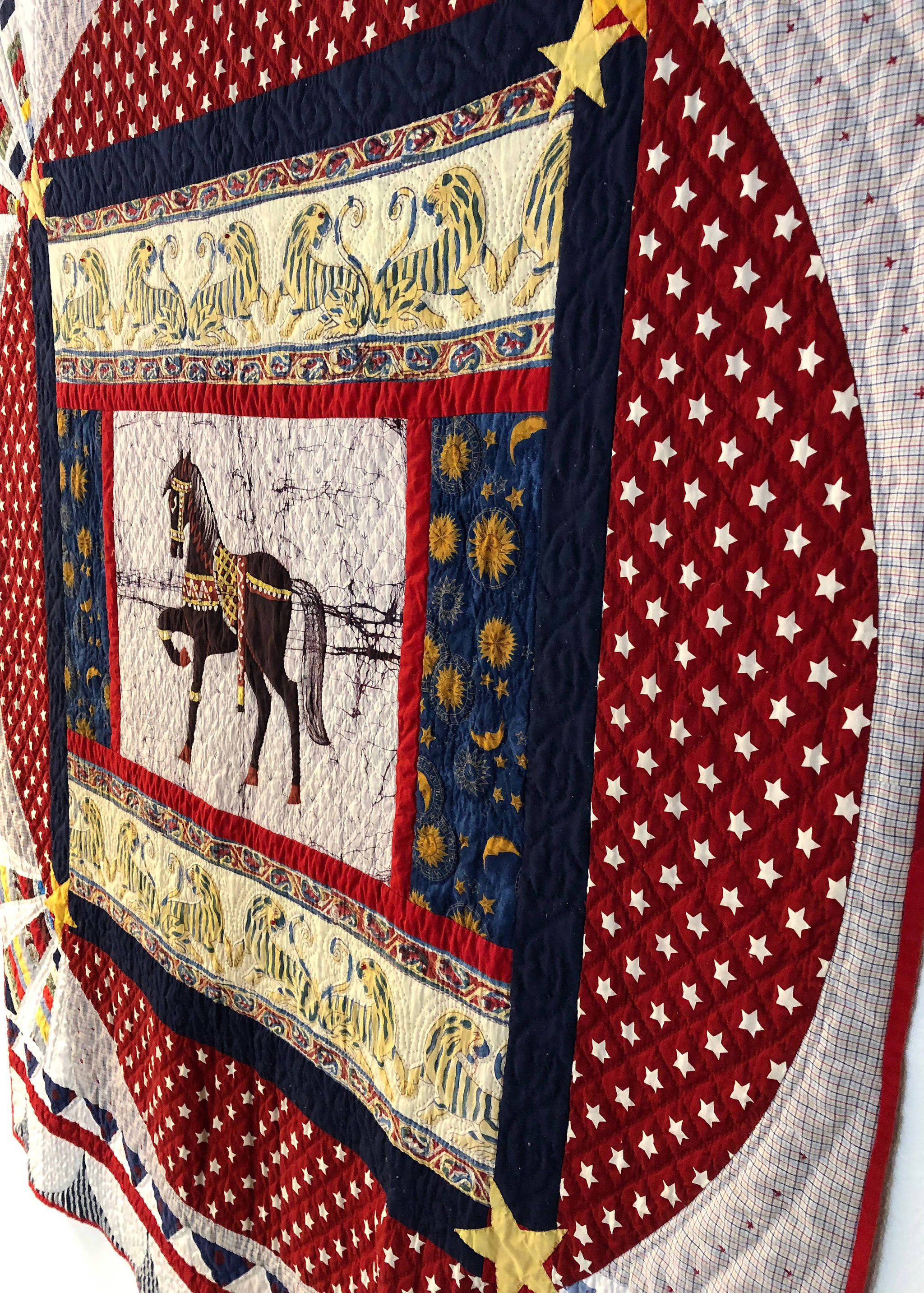 A quilt entitled, “Royal Horse”, by Betty Ames hangs on the wall Tuesday, Sept. 3, 2019, at the Kenai Fine Arts Center in Kenai, Alaska. (Photo by Joey Klecka/Peninsula Clarion)