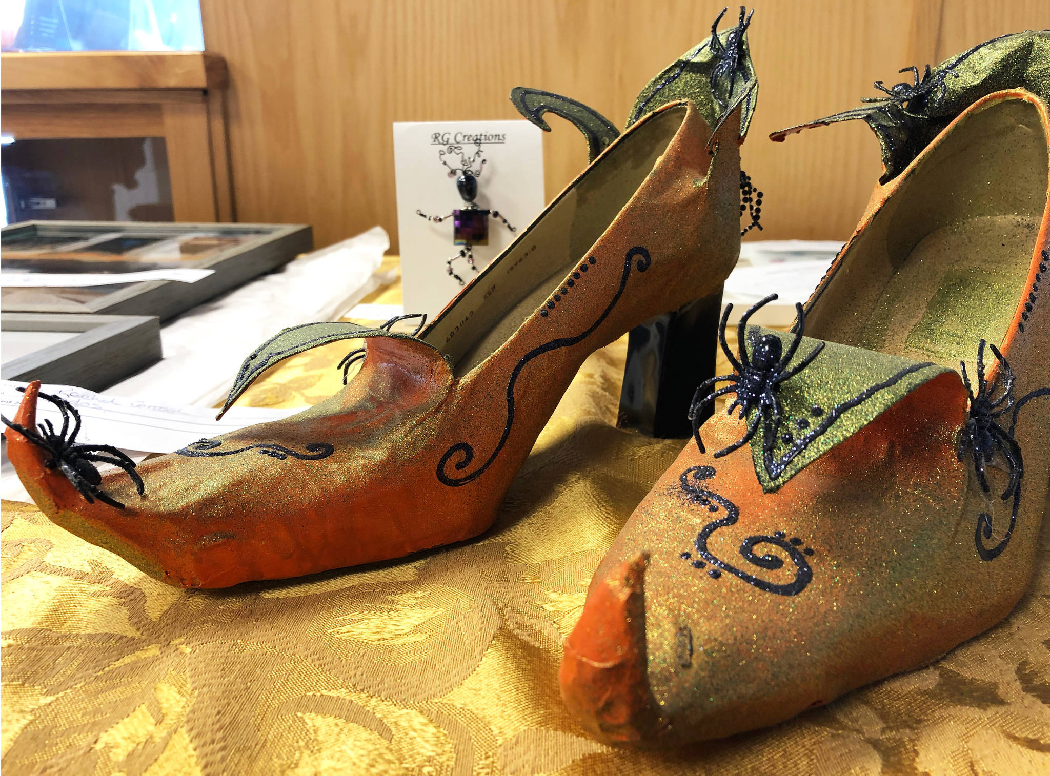 A pair of papier-mache shoes created by Rachel Grossl sit Tuesday, Sept. 3, 2019, at the Kenai Fine Arts Center in Kenai, Alaska. (Photo by Joey Klecka/Peninsula Clarion)