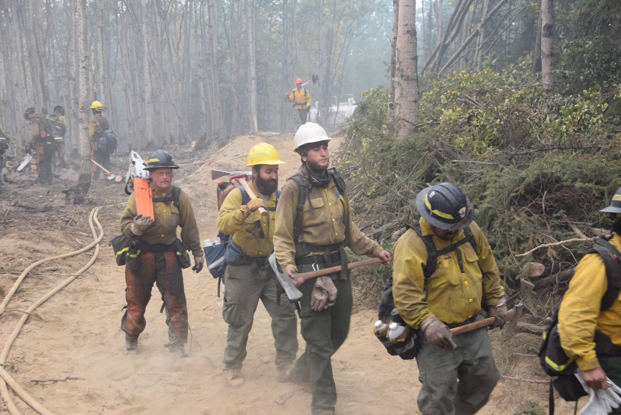 The Snake River Valley fire crew makes their way to their assignment expanding containment lines off Skilak Lake Road southeast of Sterling, Alaska on Aug. 30, 2019. (Photo by Brian Mazurek/Peninsula Clarion)